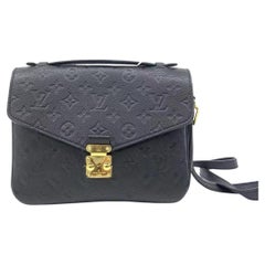 Louis Vuitton Pochette Métis Monogram Empreinte Leather Black