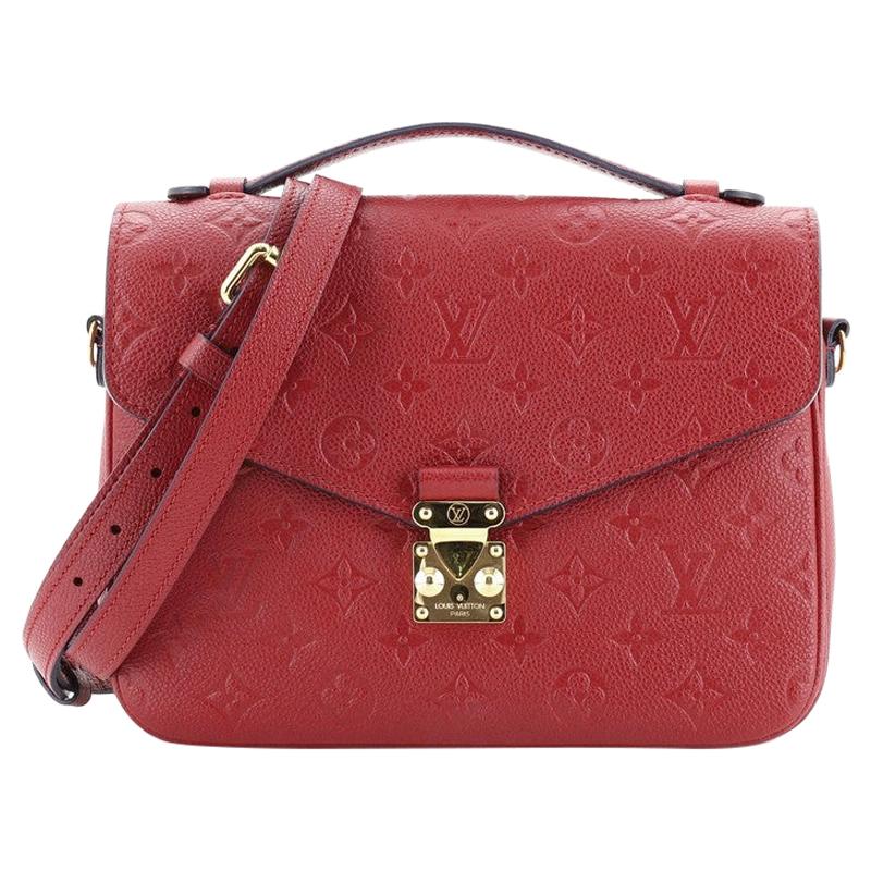 empreinte leather pochette metis