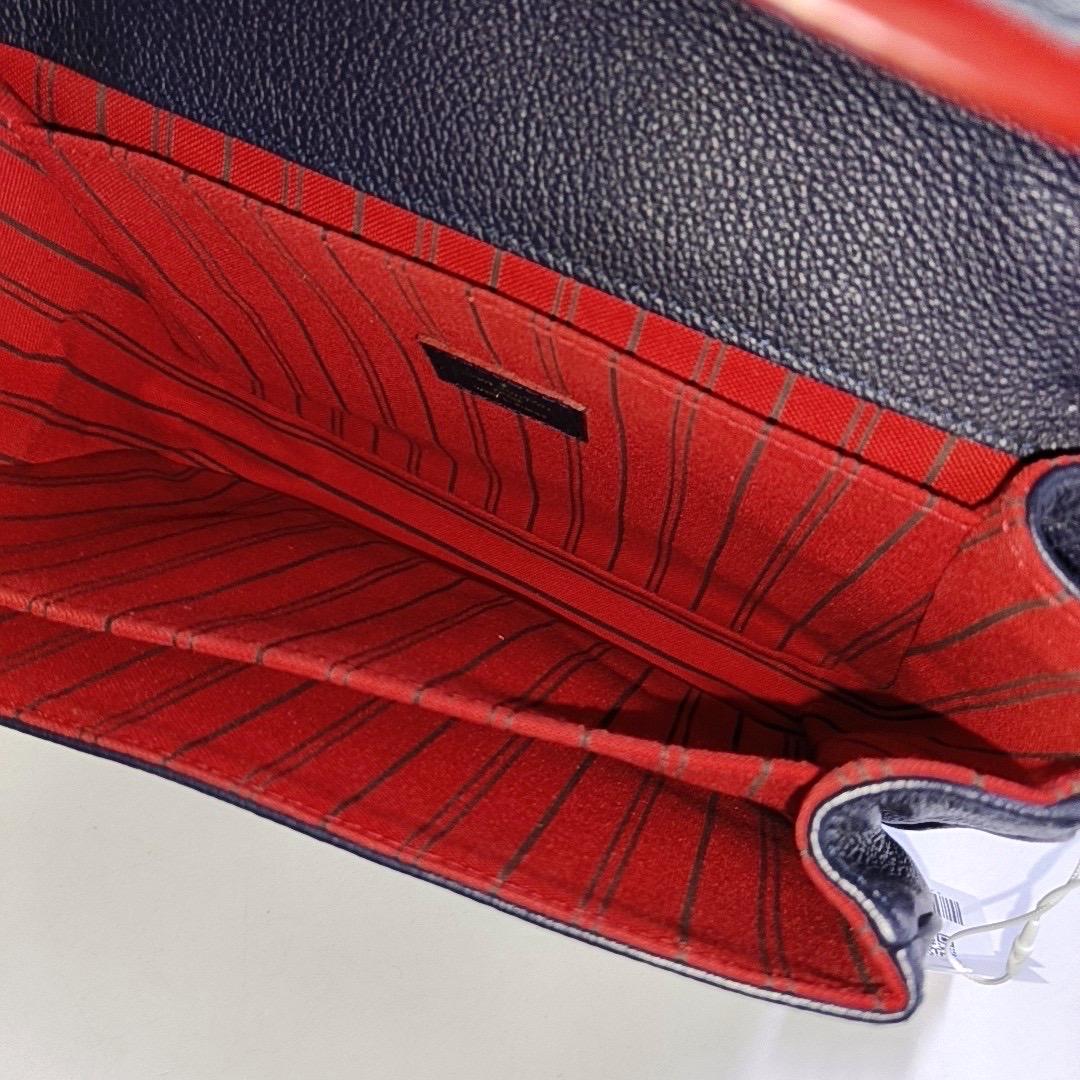 Louis Vuitton Pochette Métis Monogram Empreinte Leather Navy For Sale 1