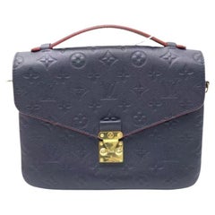 Louis Vuitton Pochette Métis Monograma Empreinte Piel Azul Marino