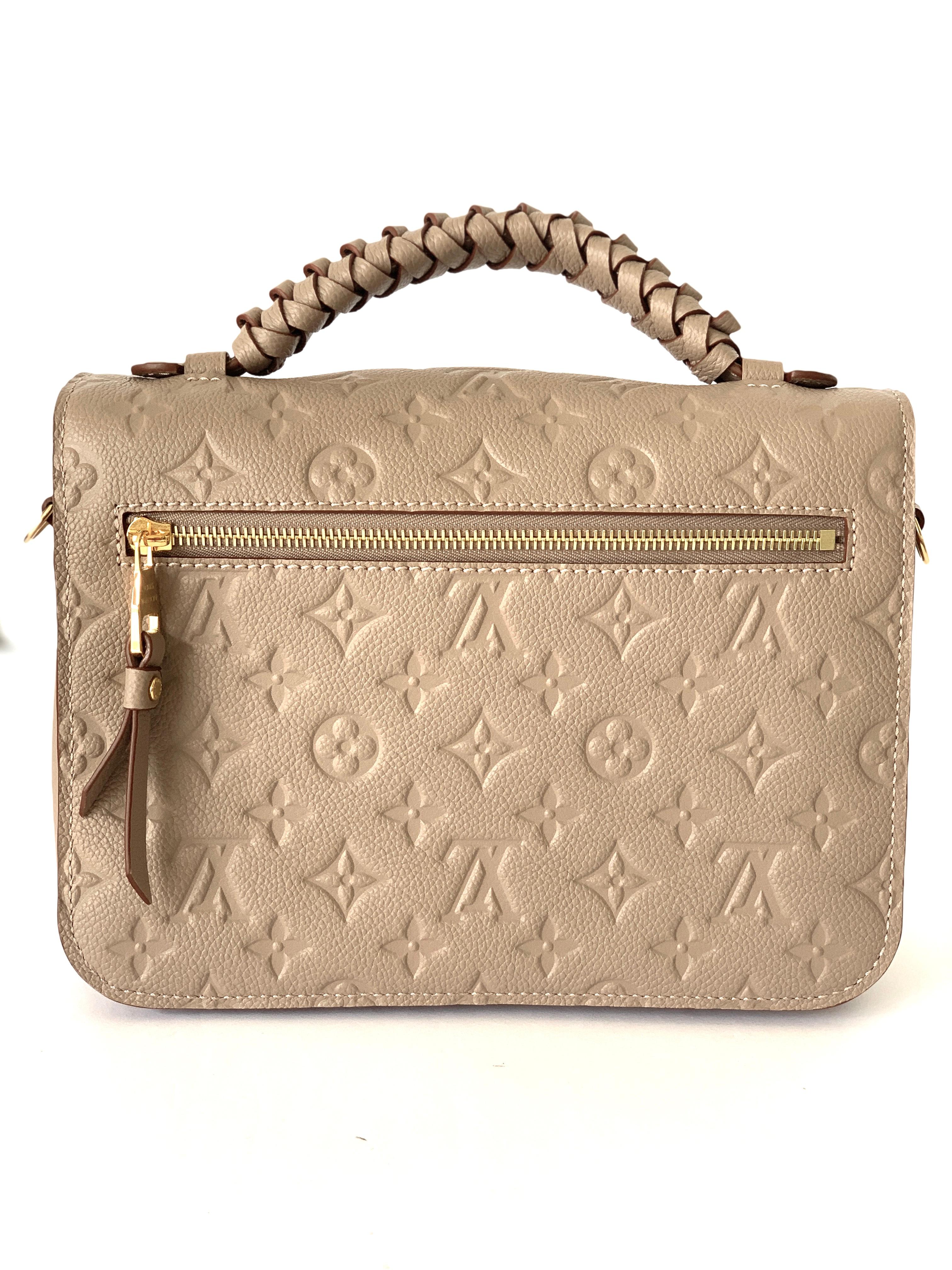 Louis Vuitton Pochette Metis Monogram Empreinte Leather Twisted Handle In New Condition In West Chester, PA