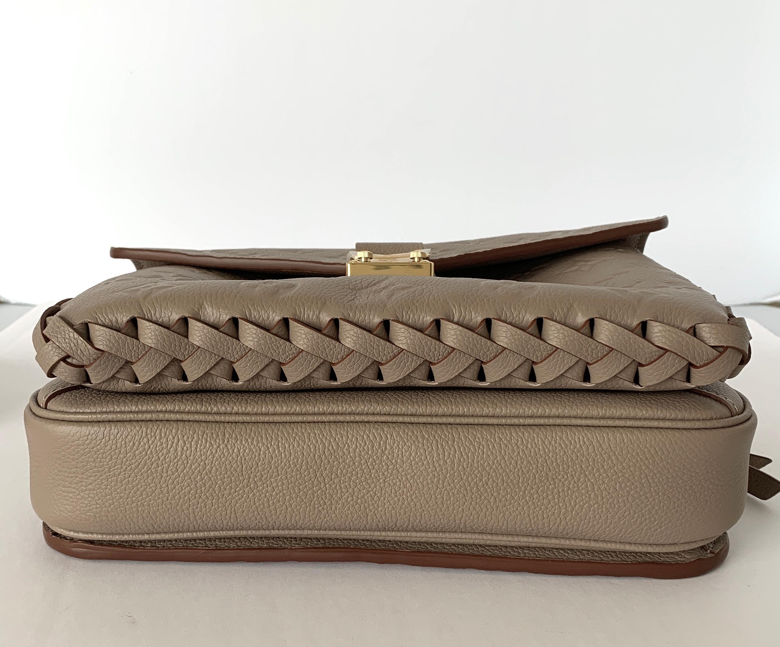 Women's or Men's Louis Vuitton Pochette Metis Monogram Empreinte Leather Twisted Handle