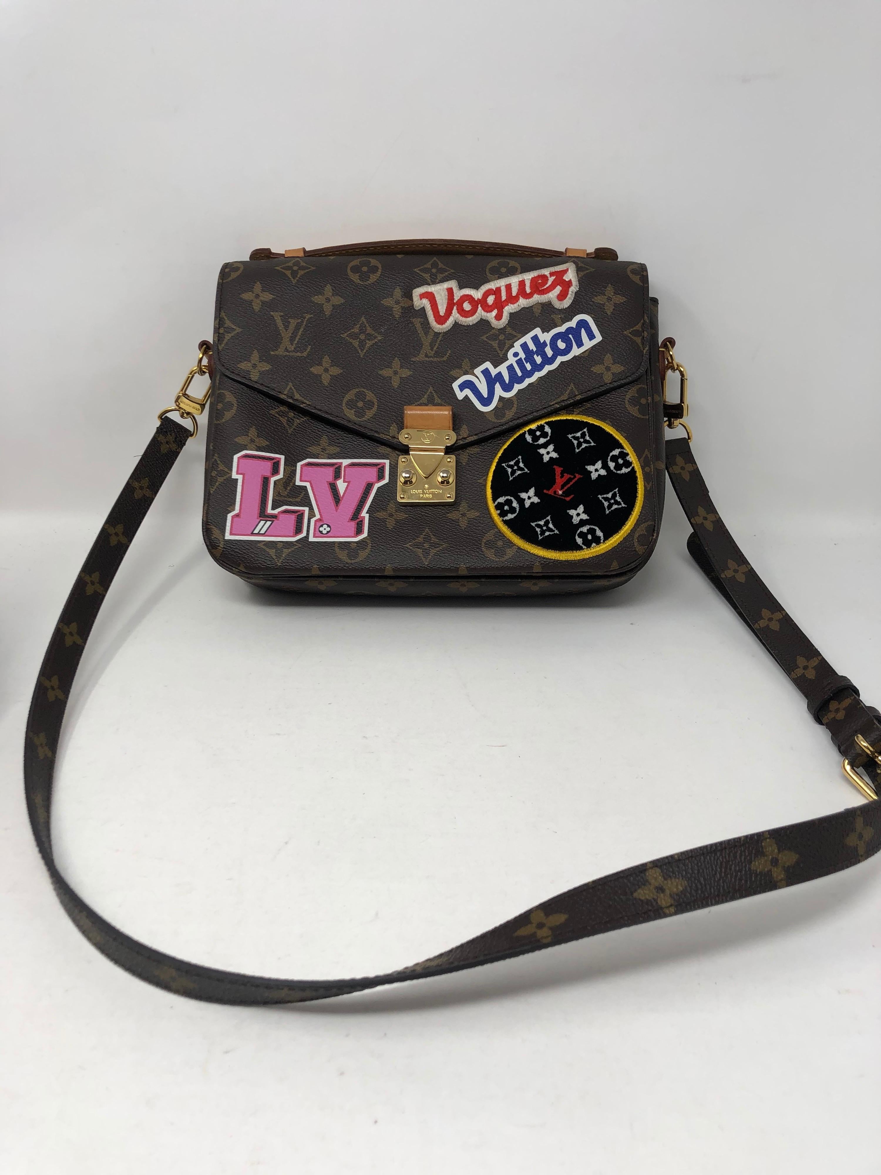 Louis Vuitton Limited Edition Patches Pochette Metis Bag. Good condition. Can be worn 2 ways. Crossbody and top handle bag. Unique collector's piece. Date code inside. Guaranteed authentic. 