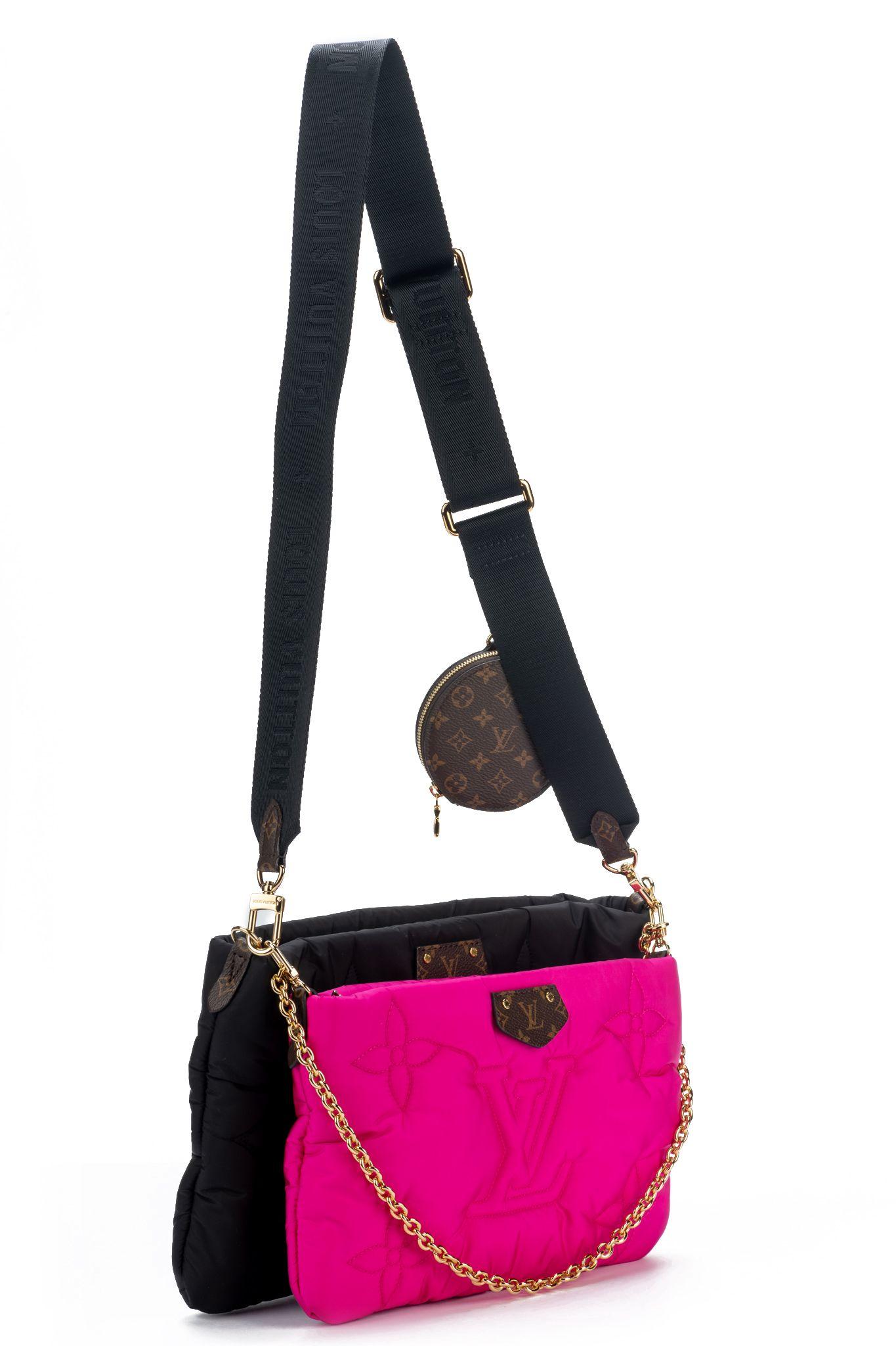 Louis Vuitton Pink and Black Monogram Econyl Nylon Maxi Multi Pochette with gold hardware from 2021. This bag is lined with brown mini monogram Econyl. The fabric is Louis Vuitton's regenerated Nylon. The piece includes an adjustable shoulder strap