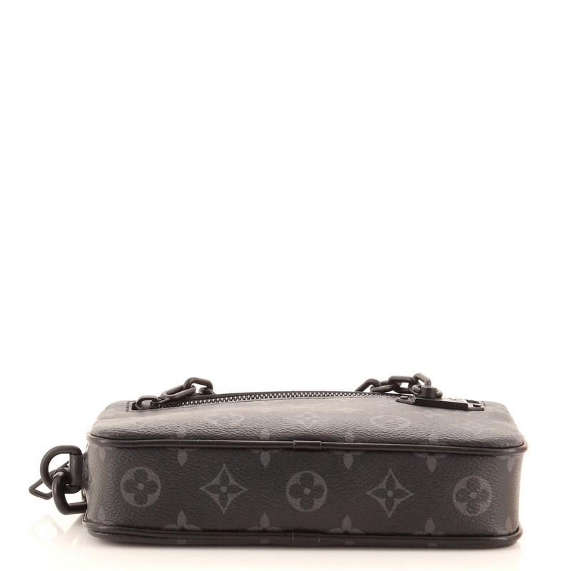 Louis Vuitton Pochette Volga Monogram Eclipse Canvas In Good Condition In NY, NY