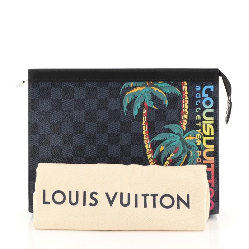 This Louis Vuitton Pochette Voyage Limited Edition Damier Cobalt Jungle MM, crafted in damier cobalt coated canvas, features a with colorful palm trees jungle-inspired print, leather trim and silver-tone hardware. Its zip closure opens to a black