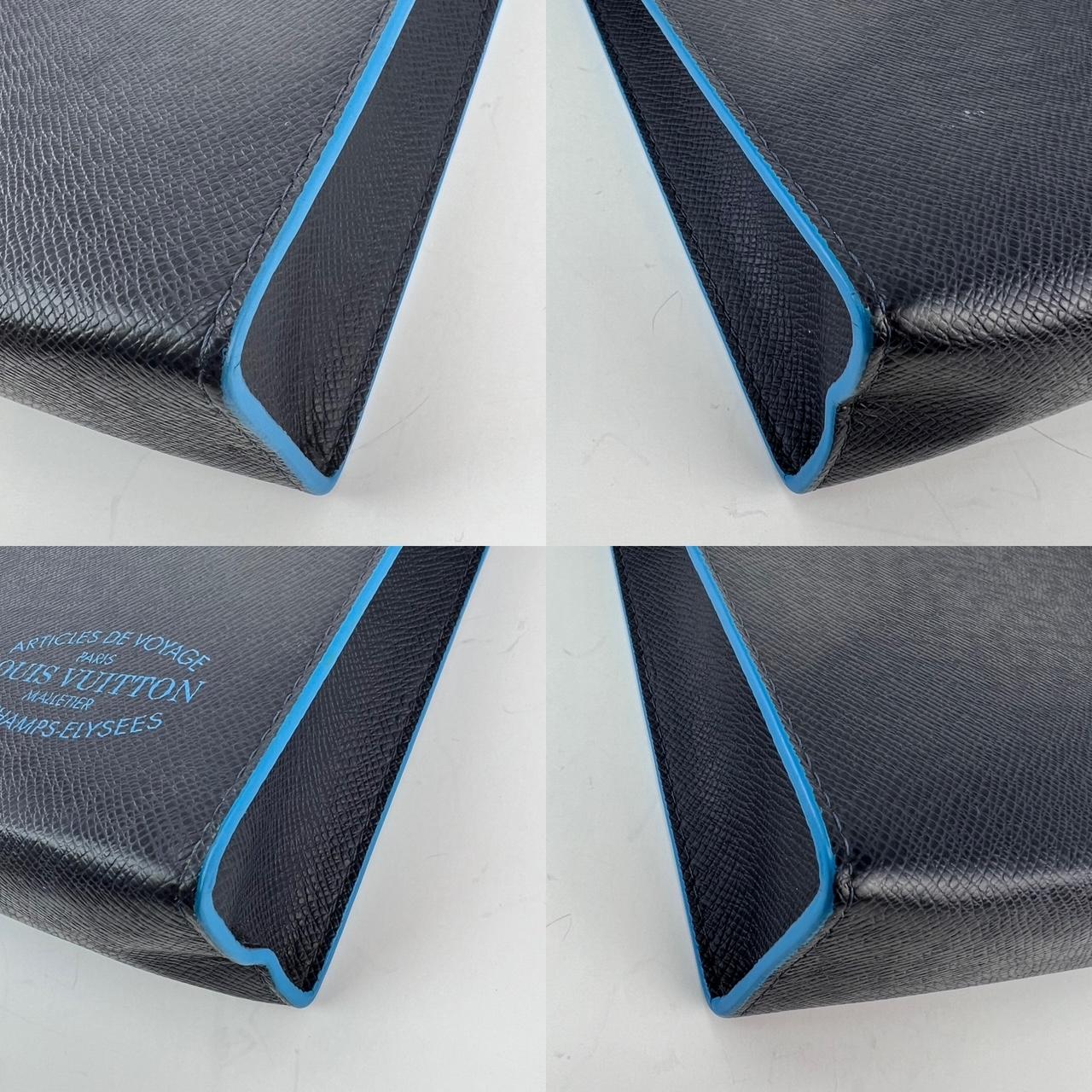 Louis Vuitton Pochette Voyage MM Taiga Dark Blue Leather Hand Bag Limited Ed In Excellent Condition For Sale In Freehold, NJ