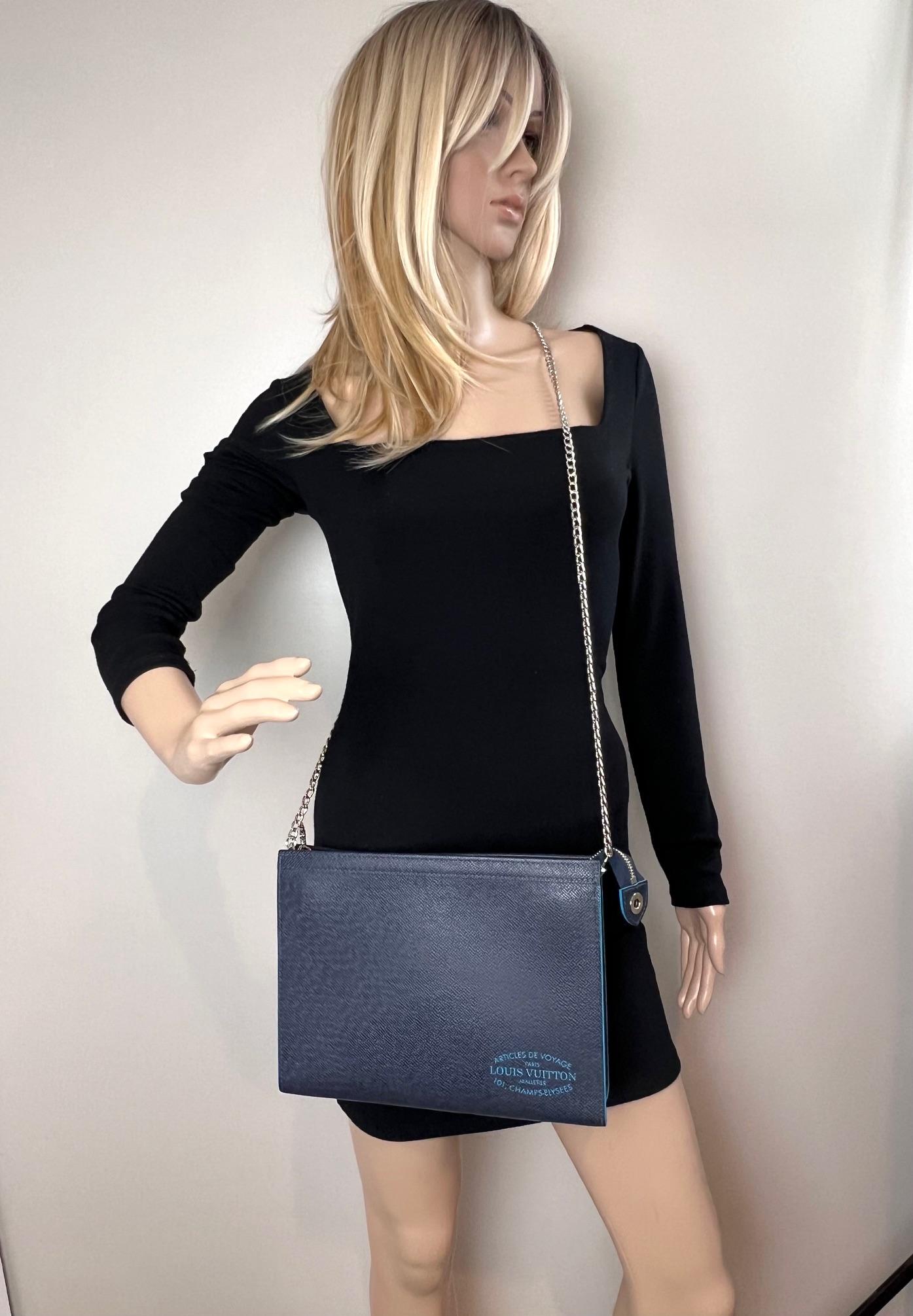 Women's or Men's Louis Vuitton Pochette Voyage MM Taiga Dark Blue Leather Hand Bag Limited Ed For Sale