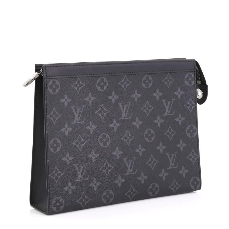 This Louis Vuitton Pochette Voyage Monogram Eclipse Canvas MM, crafted in black monogram eclipse coated canvas, features leather trim and gunmetal-tone hardware. Its zip closure opens to a black fabric and leather interior with multiple card slots