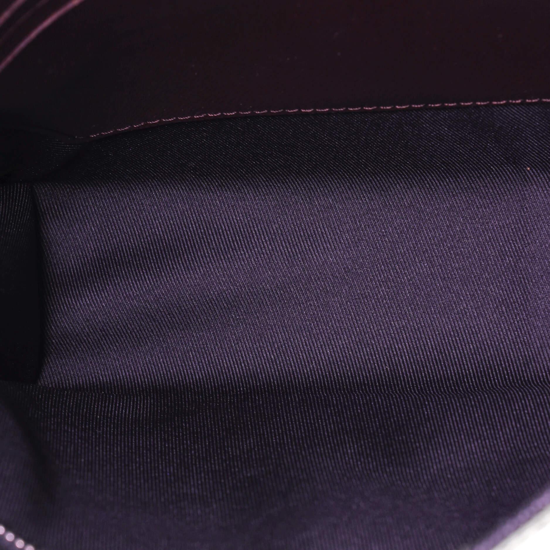 Louis Vuitton Pochette Voyage Taiga Leather MM 1