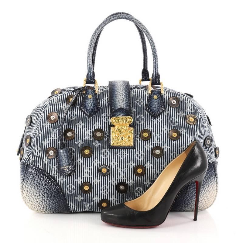 This authentic Louis Vuitton Polka Dot Trunks Bowly Handbag Denim presented in the brand's Spring/Summer 2007 Collection from designer Marc Jacobs is a hard-to-find collector's item made for LV lovers. Crafted from Louis Vuitton monogram striped