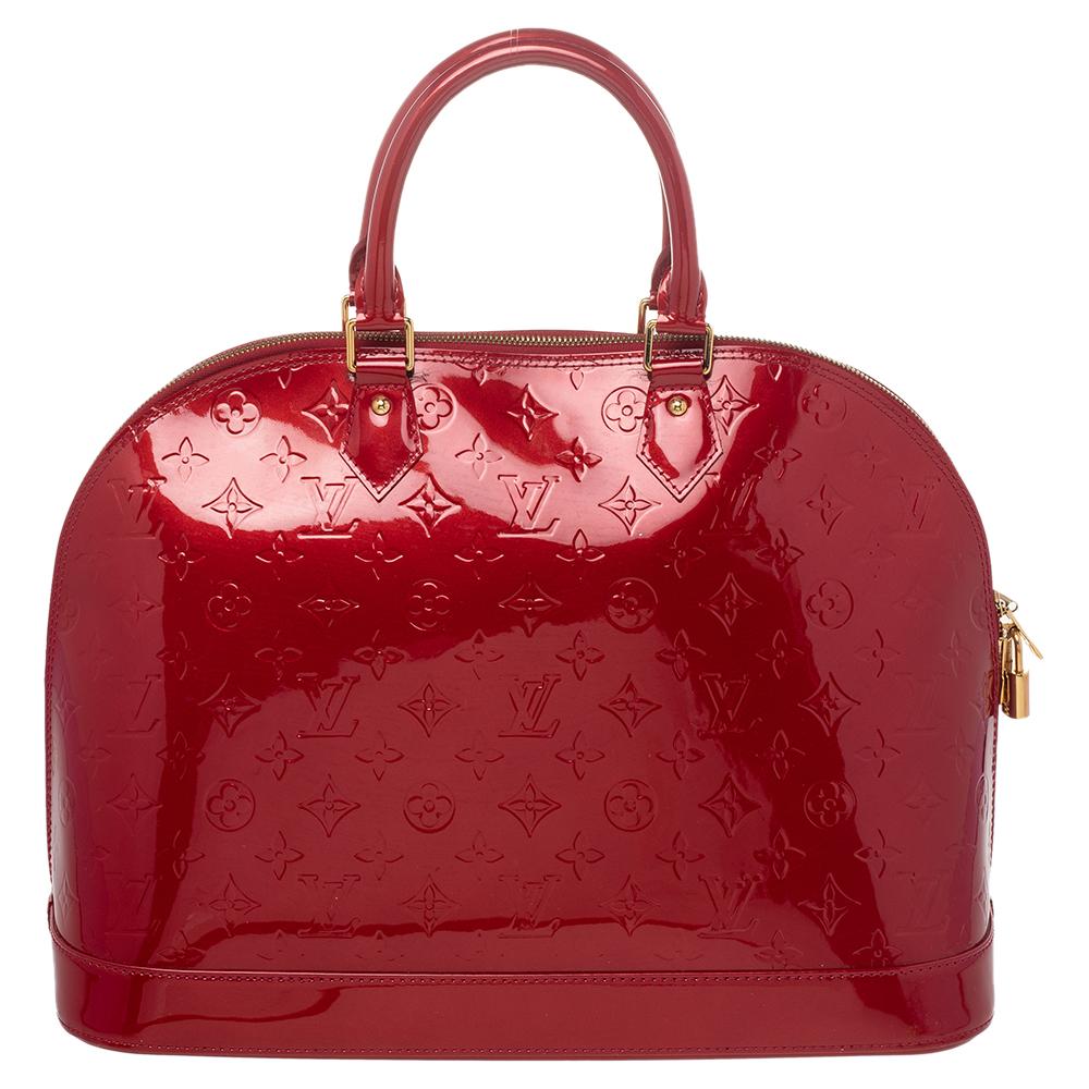 Out of all the irresistible handbags from Louis Vuitton, the Alma is the most structured one. First introduced in 1934 by Gaston-Louis Vuitton, the Alma is a classic that has received love from icons. This piece comes crafted from Monogram Vernis