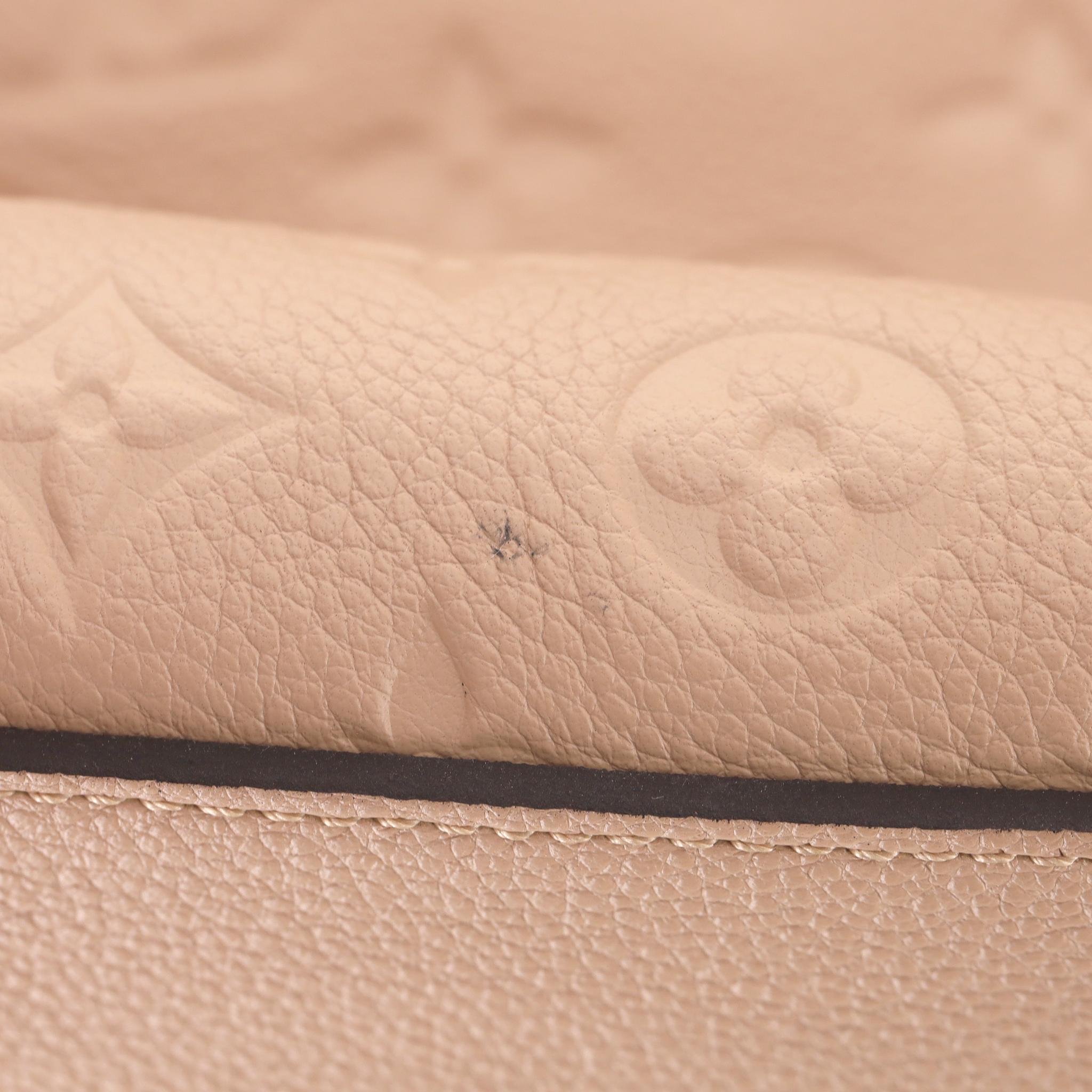 Louis Vuitton Pont Neuf Dune Monogram Empreinte Leather GM Bag en vente 9