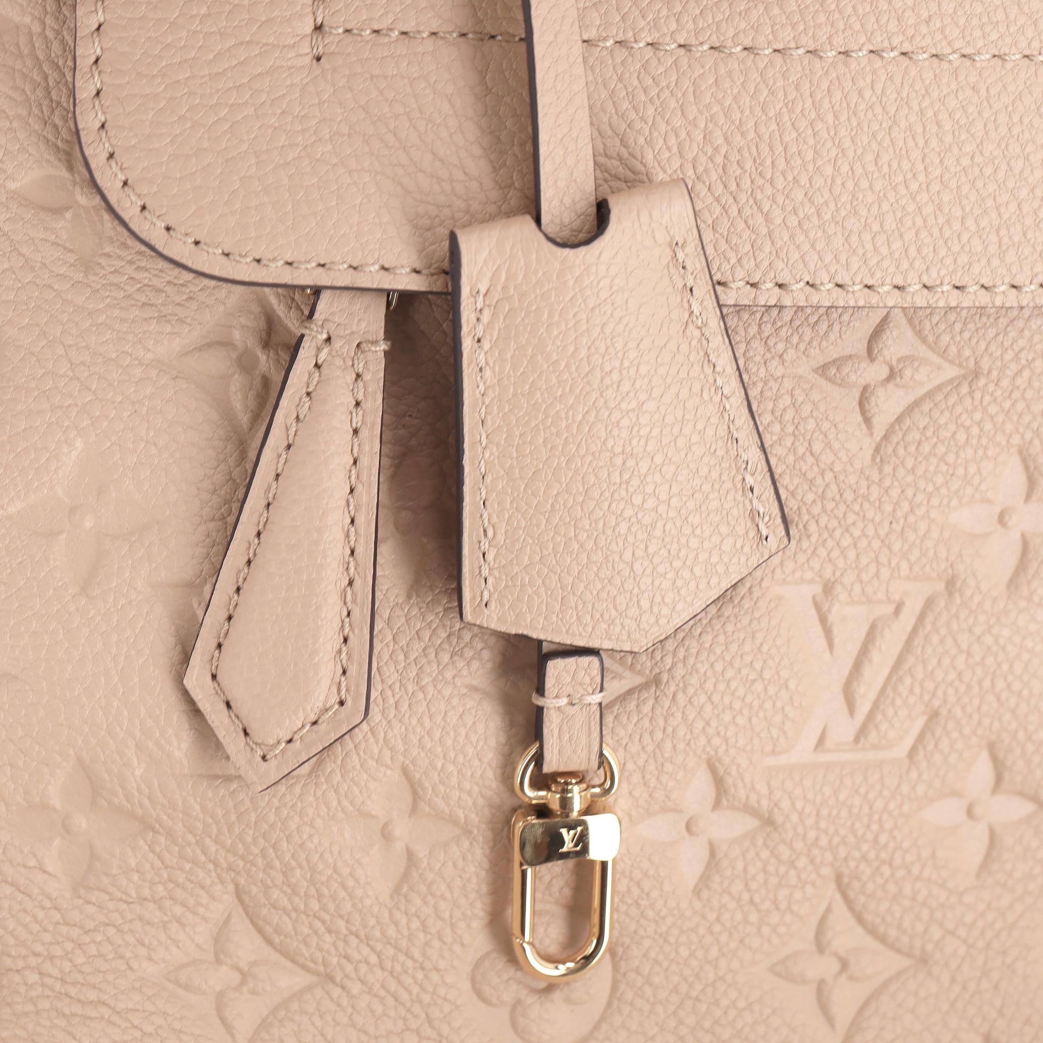 Louis Vuitton Pont Neuf Dune Monogram Empreinte Leather GM Bag en vente 3