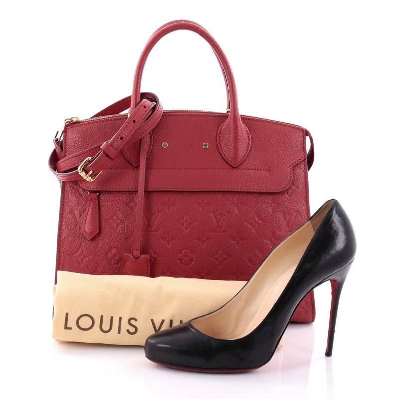 This authentic Louis Vuitton Pont Neuf Handbag Monogram Empreinte Leather MM is a classic must-have structured handle bag. Constructed in sturdy red monogram empreinte leather, this simple and functional bag showcases dual rolled leather handles,