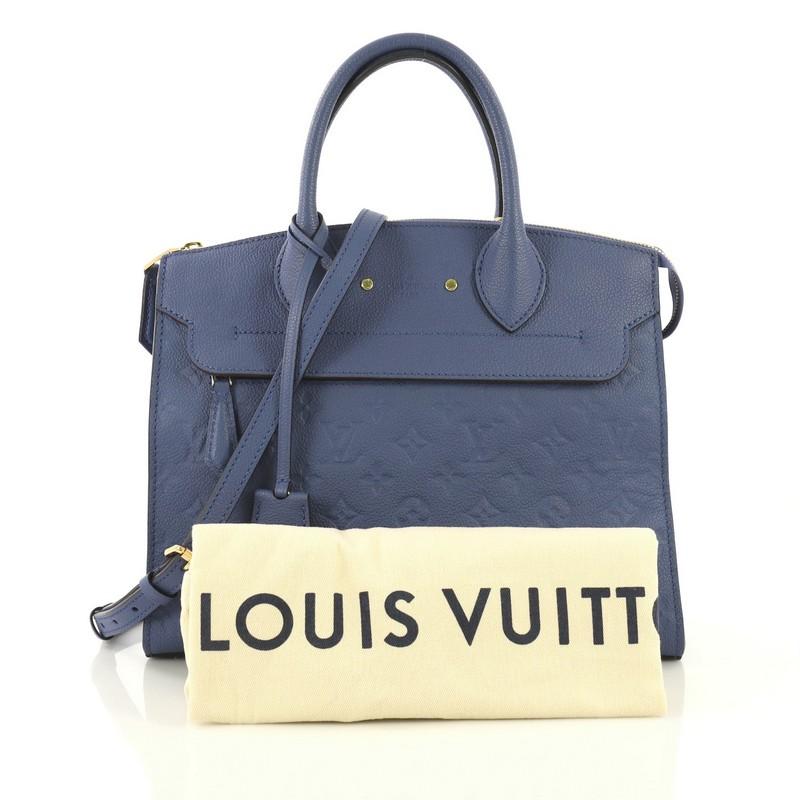 This Louis Vuitton Pont Neuf Handbag Monogram Empreinte Leather MM, crafted in blue monogram empreinte leather, features dual rolled leather handles, protective base studs and gold-tone hardware. Its zip closure opens to a blue fabric interior with