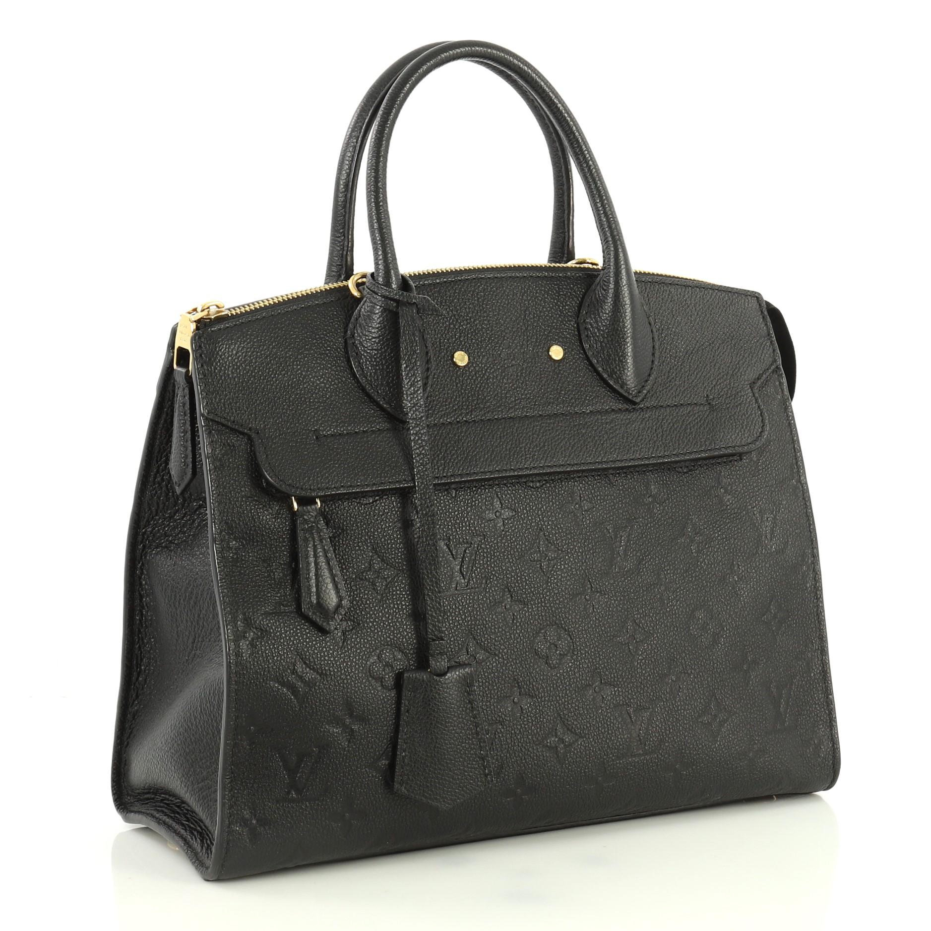 This Louis Vuitton Pont Neuf Handbag Monogram Empreinte Leather MM, crafted in black monogram empreinte leather, features dual rolled leather handles, zip compartments at the front and back, and gold-tone hardware. It opens to a gray fabric
