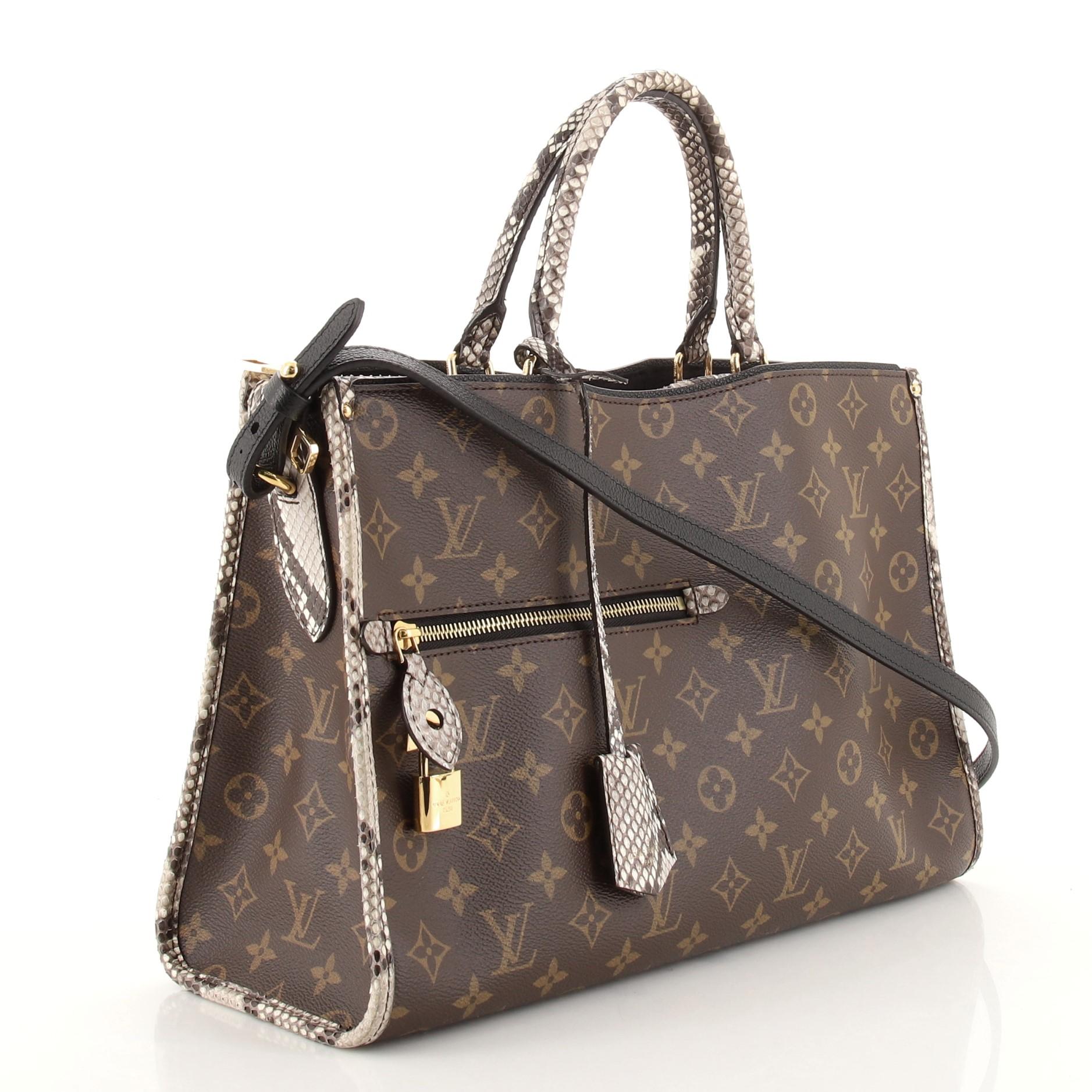 This item can only be shipped within the United States.

Condition: Very good. Light odor in interior. Slight creasing on exterior, mark on rear, lifting of scales on trims, handle, clochette and interior opening trim. Wear in interior, scratches on