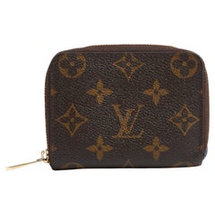 Louis Vuitton Porte monnaie Zippy LV Monogram and leather compact wallet