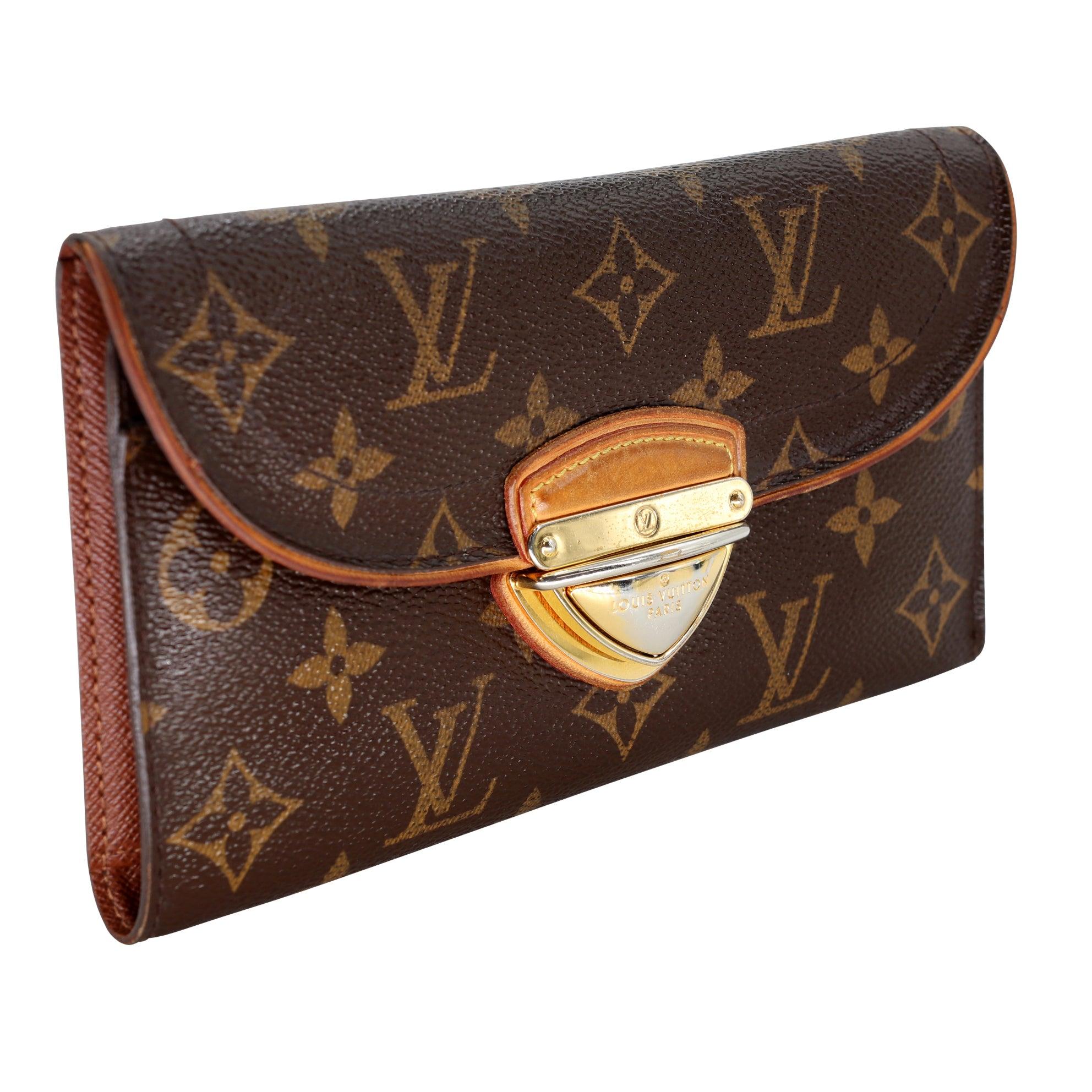 The Louis Vuitton Eugenie koala wallet is perfect if you're seeking something sleek and compact with elegant gold detail. With many credit card slots, ID window and bill compartment, it will be the only wallet you will want to take with you