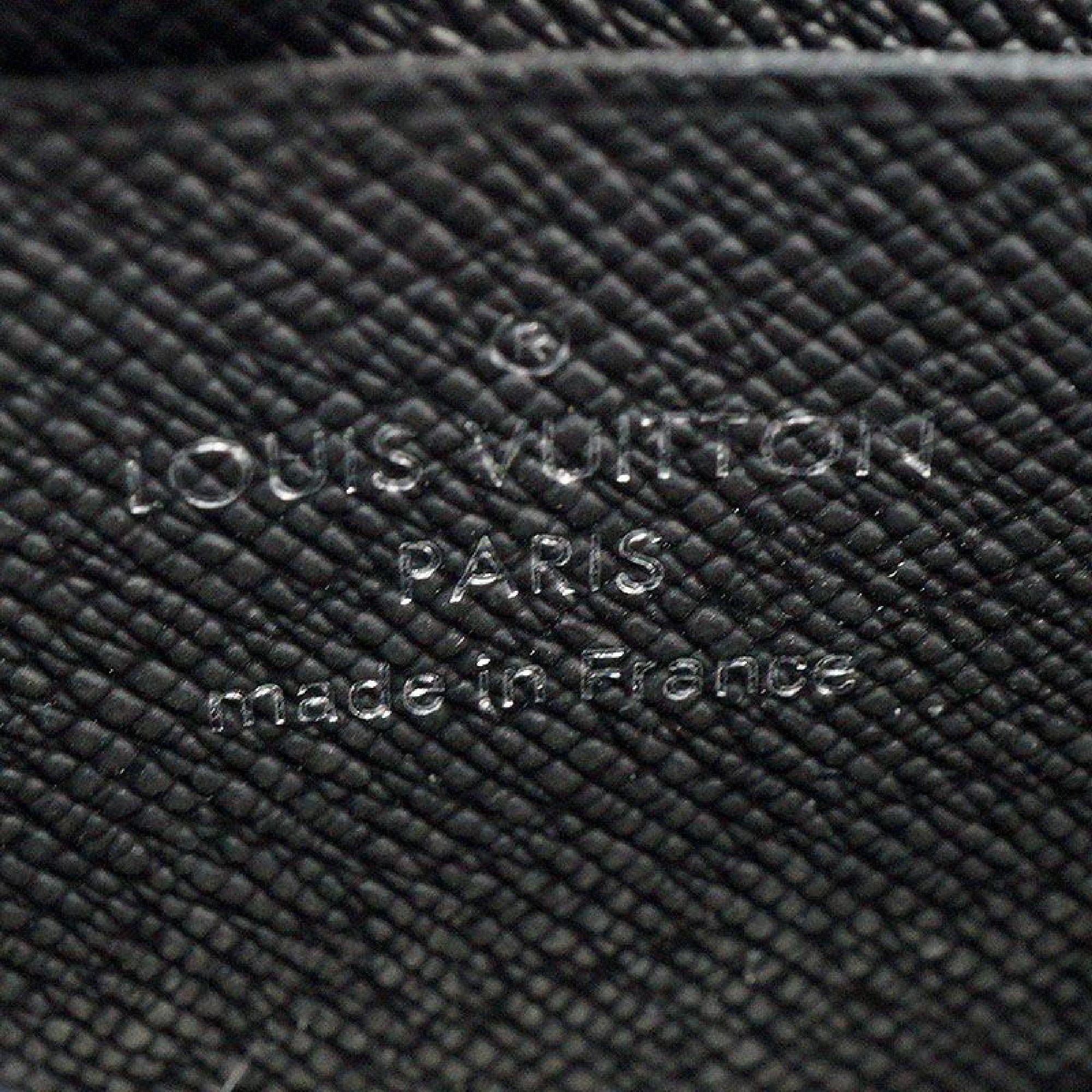 Black LOUIS VUITTON Portumone Jules Mens coin case M63536