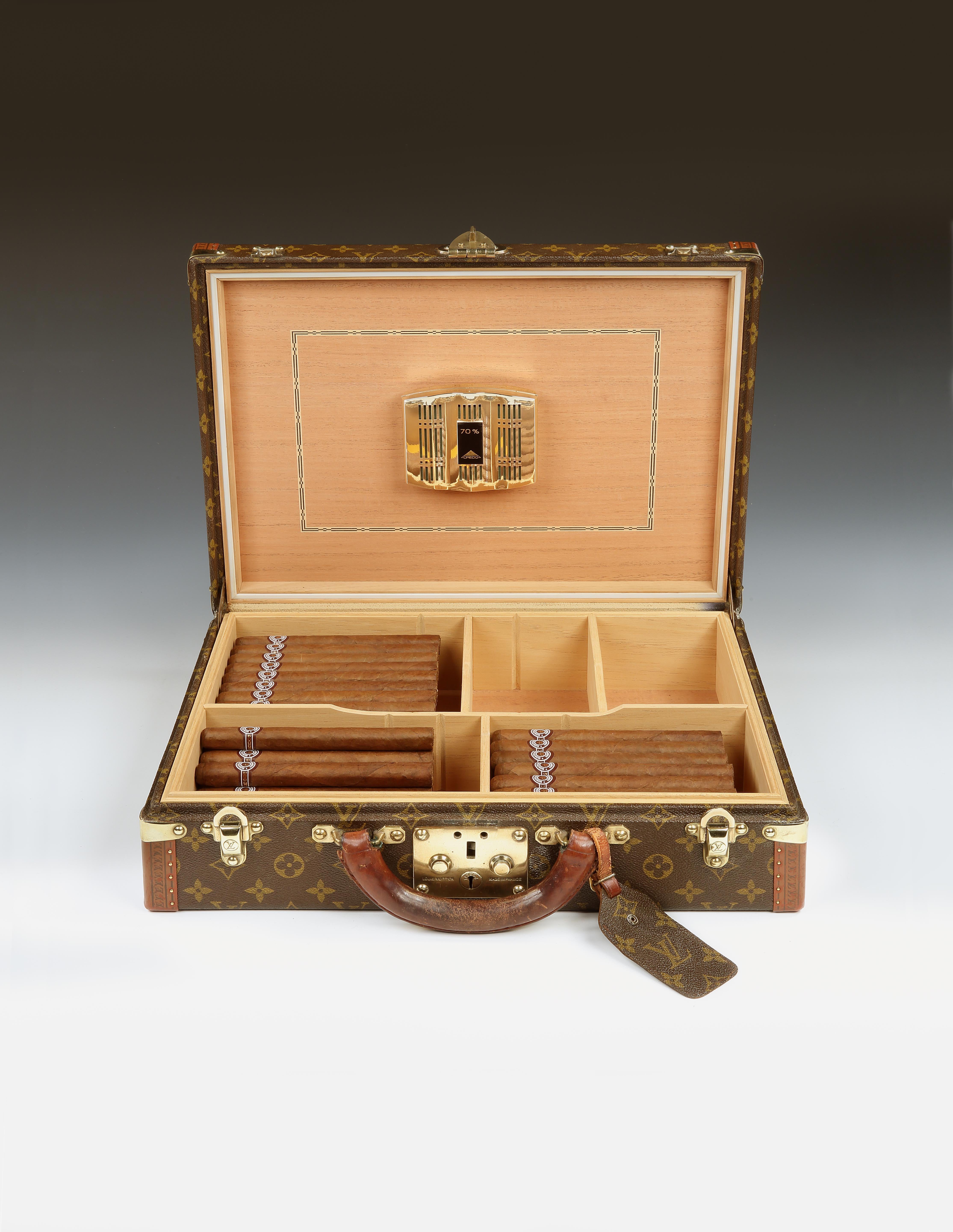 Louis Vuitton, Paris

An original 1960s Président briefcase in the Classic Monogramme pattern, the interior fully converted by our expert humidor specialists into a generous Spanish cedar-lined cigar humidor, with removable and adjustable dividers