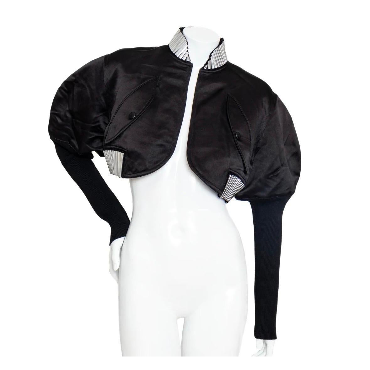 Louis Vuitton Puff Sleeve Bomber Jacket
Circa 2019; limited
Iconic Nicolas Ghesquière silhouette
Cropped bomber jacket
Silver-tone tube trim on collar and hem
Tight knitted sleeves
Front flap pockets with snap closure
Classic LV monogram quilted