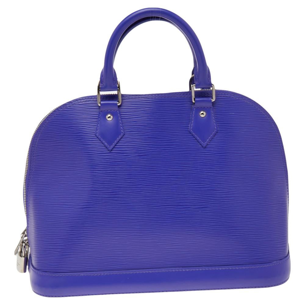 Out of all the irresistible handbags from Louis Vuitton, the Alma is the most structured one. First introduced in 1934 by Gaston-Louis Vuitton, the Alma is a classic that has received love from icons. This piece comes crafted from epi leather,