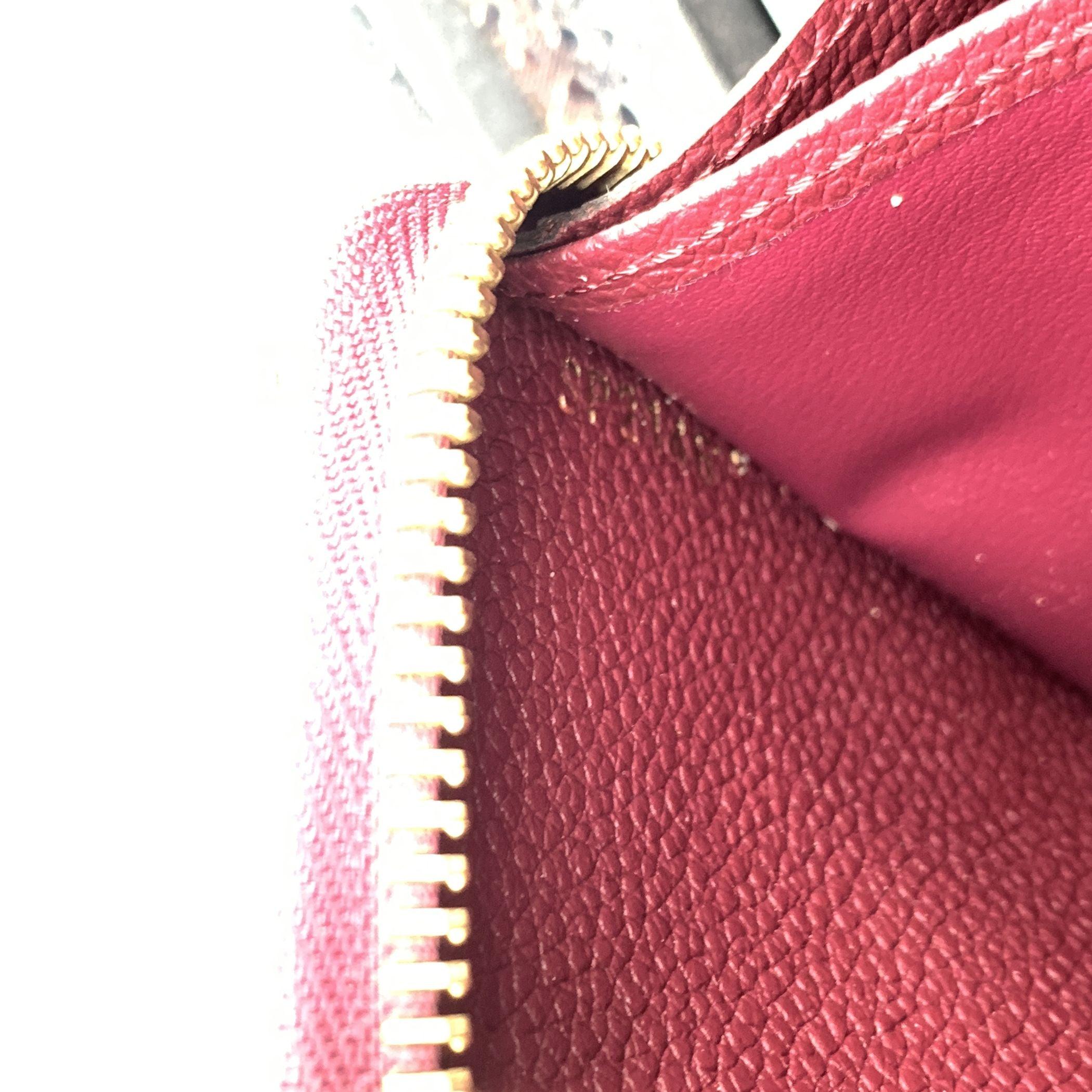 Louis Vuitton Portafoglio lungo in pelle Monogram Empreinte viola con zip In condizioni buone in vendita a Rome, Rome