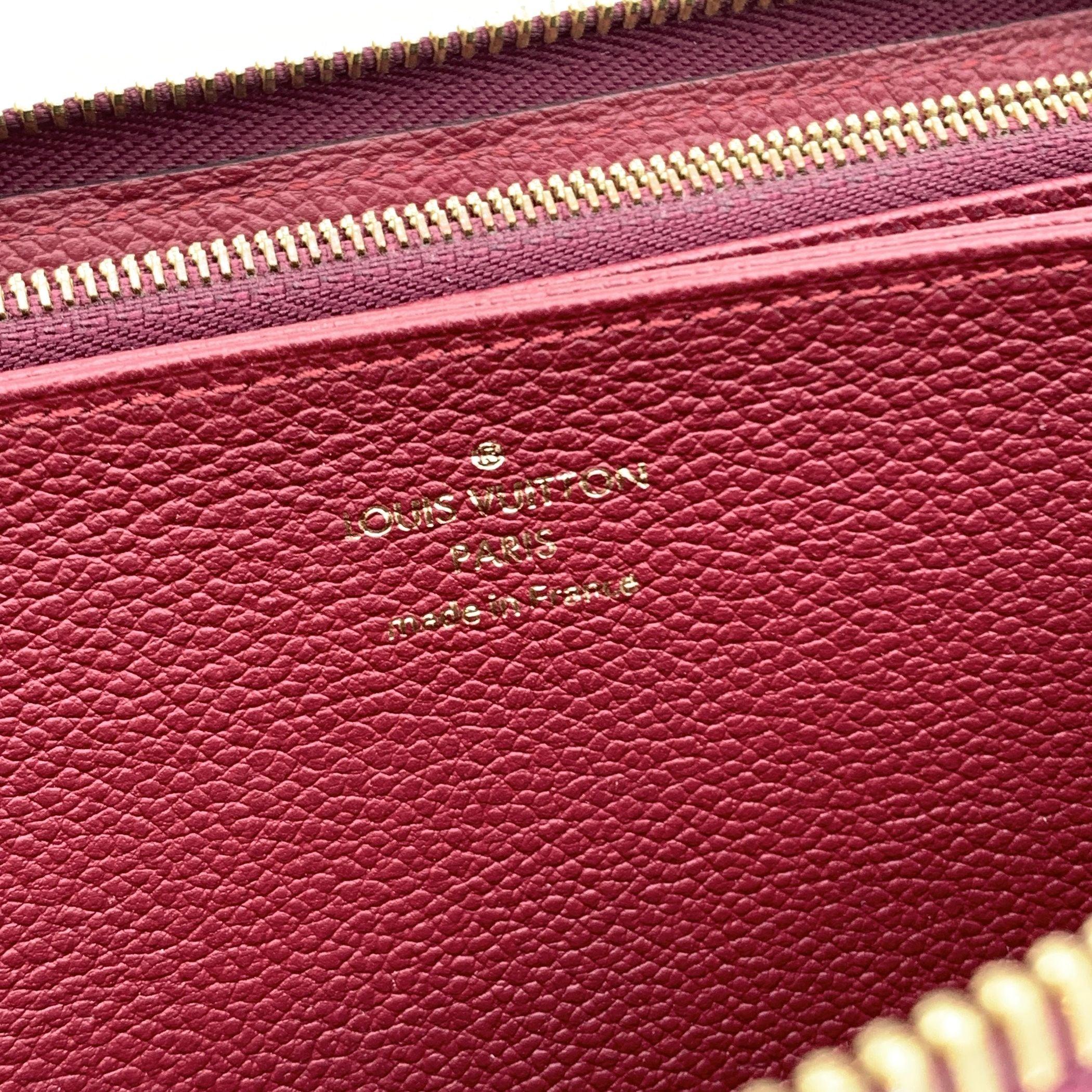 Louis Vuitton Portafoglio lungo in pelle Monogram Empreinte viola con zip in vendita 1