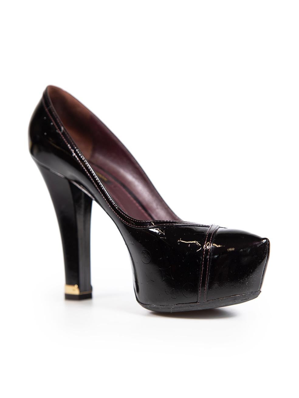 CONDITION is Very good. Minimal wear to heels is evident. Light marks to the front of both shoes and to the heel of the right shoe on this used Louis Vuitton designer resale item. Please note that the shoes have been resoled. This item comes with an