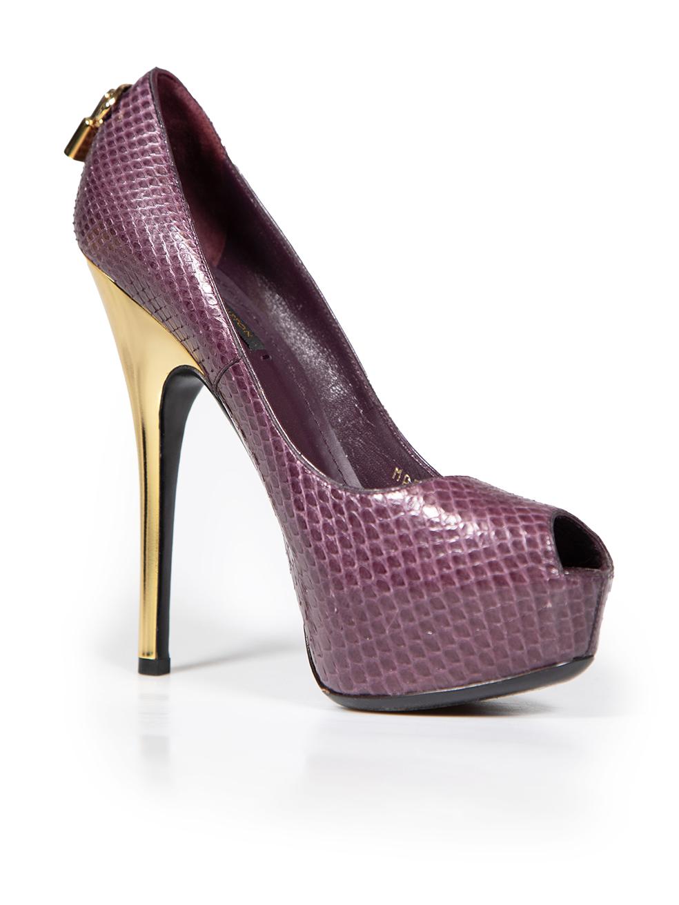 CONDITION is Very good. Minimal wear to heels is evident. Minimal pilling to overall snakeskin leather on both shoes. Minimal scratches to the metal heel of both shoes on this used Louis Vuitton designer resale item.
 
 
 
 Details
 
 
 Model: Oh