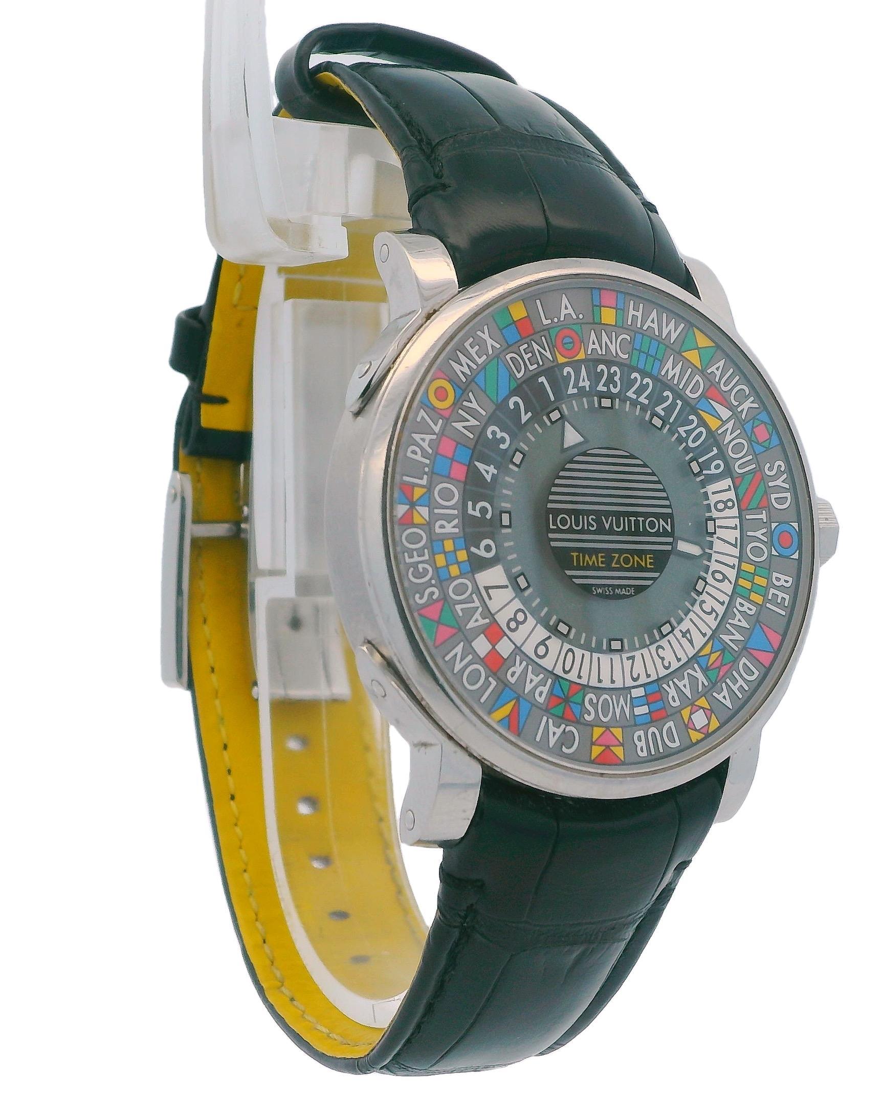 A luxury Louis Vuitton Time Zone Watch, model Q5D20, crafted from stainless steel. It features automatic movement and a round shape with a 39mm multicolor dial that displays world time. The watch has an exhibition case back and is complemented by a