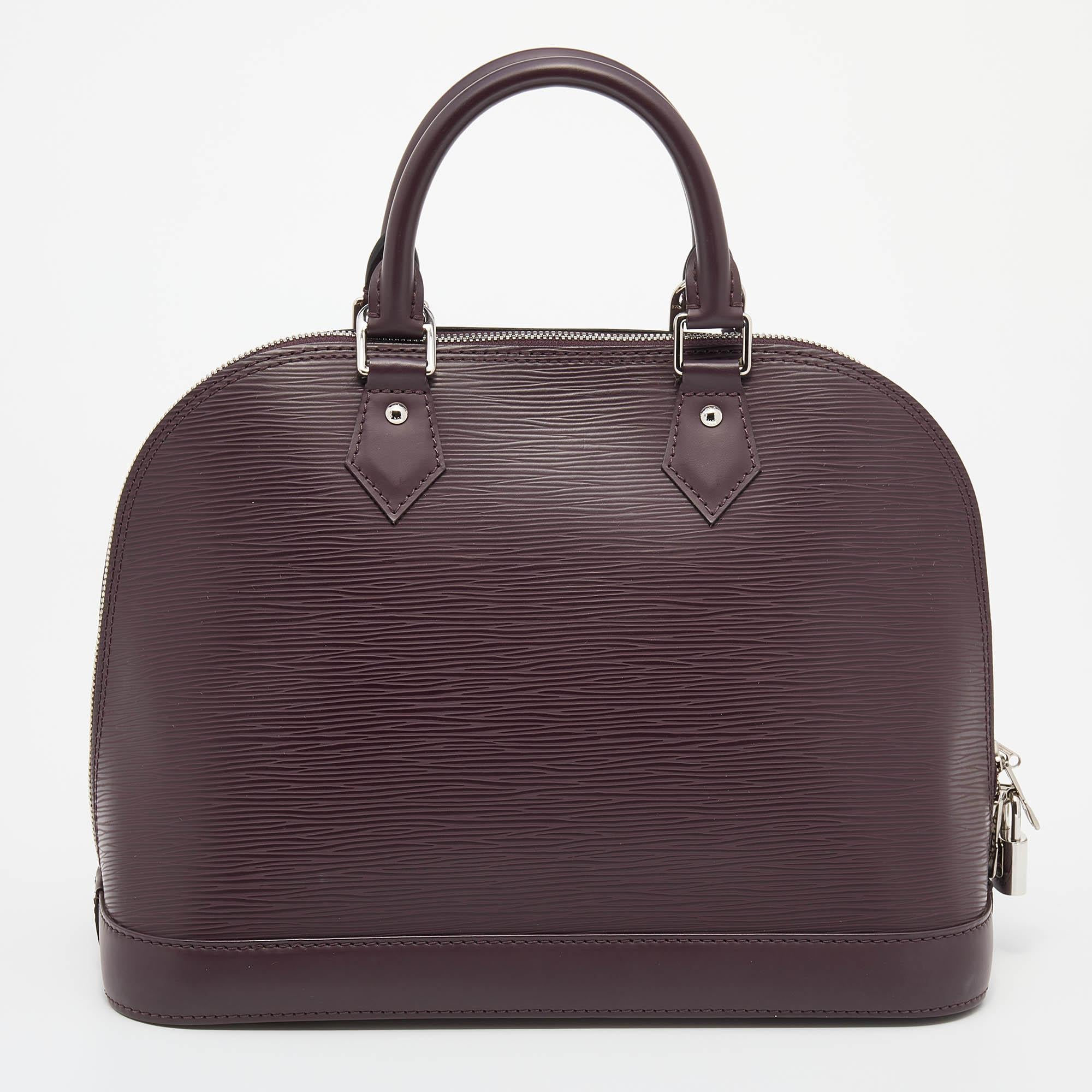 The Louis Vuitton Alma PM comes crafted from Epi leather, featuring double zippers with an Alcantara interior. Two handles are provided for you to elegantly parade it. Every closet deserves an Alma, including yours.

Includes: Original Dustbag, Info