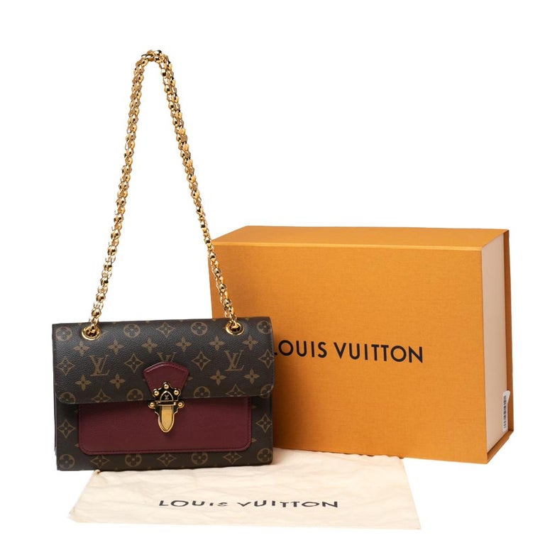 Louis Vuitton Raisin Monogram Canvas Victoire Bag at 1stDibs