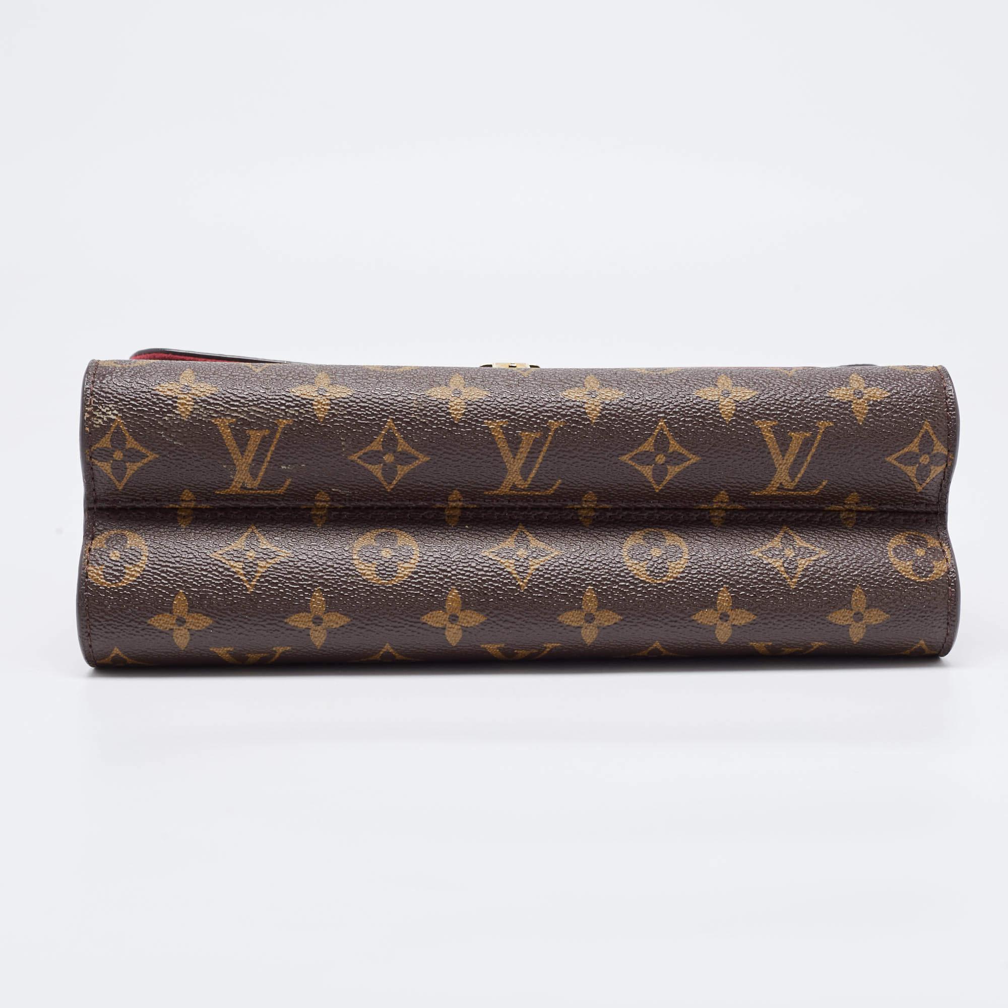 Women's Louis Vuitton Raisin Monogram Canvas Victoire Bag