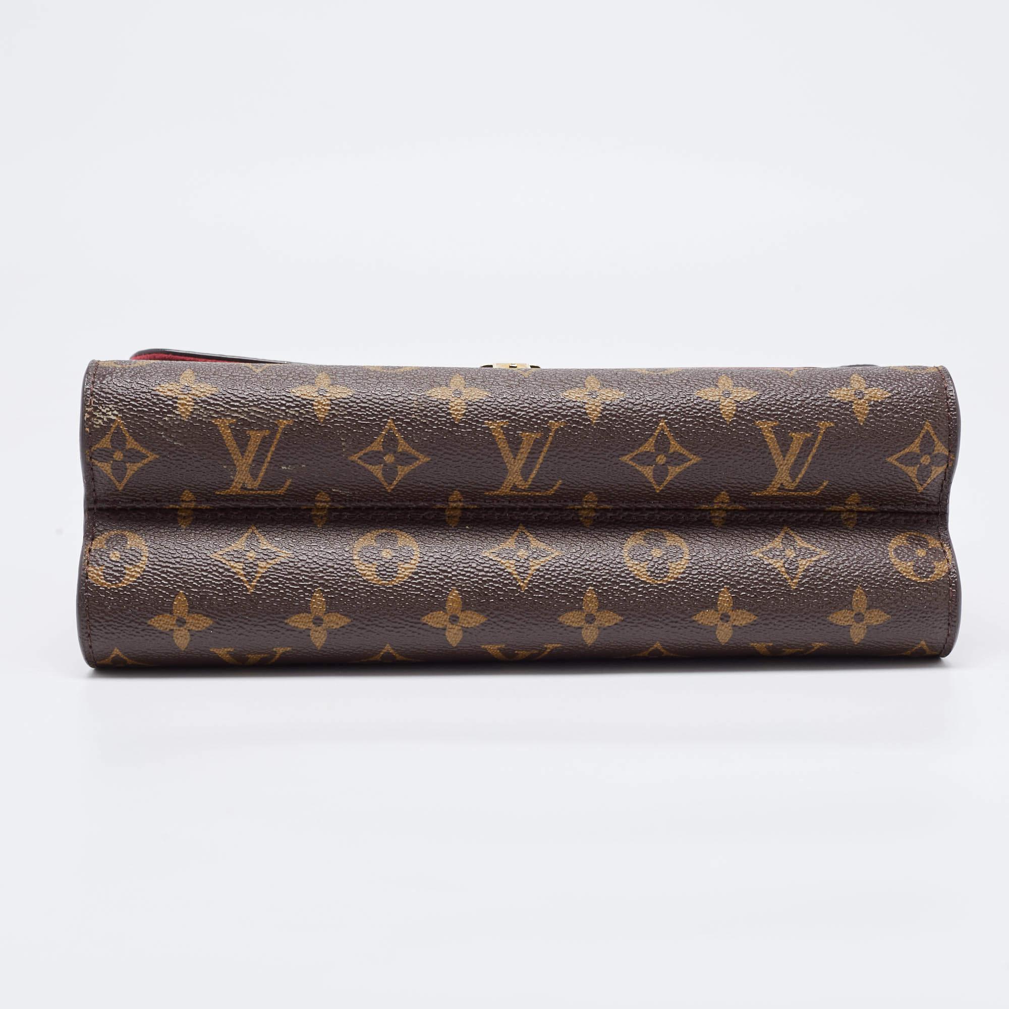 Women's Louis Vuitton Raisin Monogram Canvas Victoire Bag