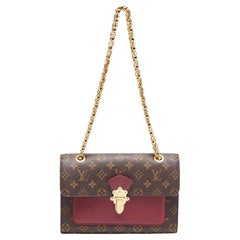 Louis Vuitton Raisin Monogram Canvas Victoire Bag