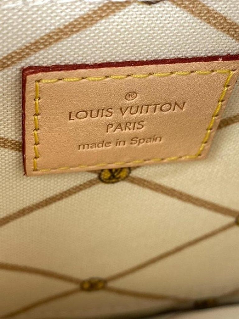 Louis Vuitton Rare Summer Trunks Monogram Neverfull Pochette GM Wristlet  Bag For Sale at 1stDibs  louis vuitton neverfull serial number location,  neverfull wristlet, depose en france etal etranger louis vuitton
