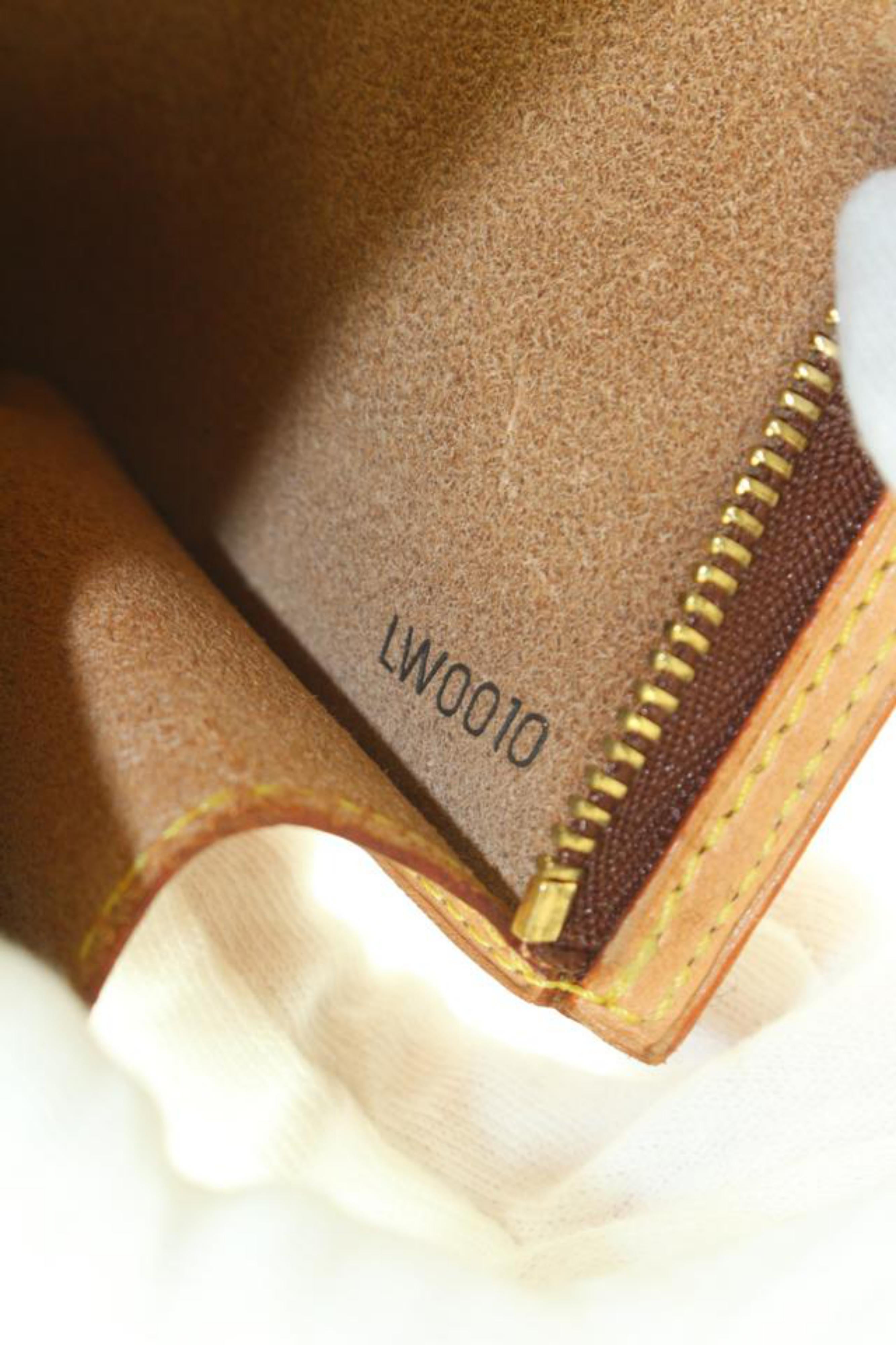 Louis Vuitton Rare Vachetta Leather Micro Pochette Accessories 1LVJ1021 In Good Condition In Dix hills, NY