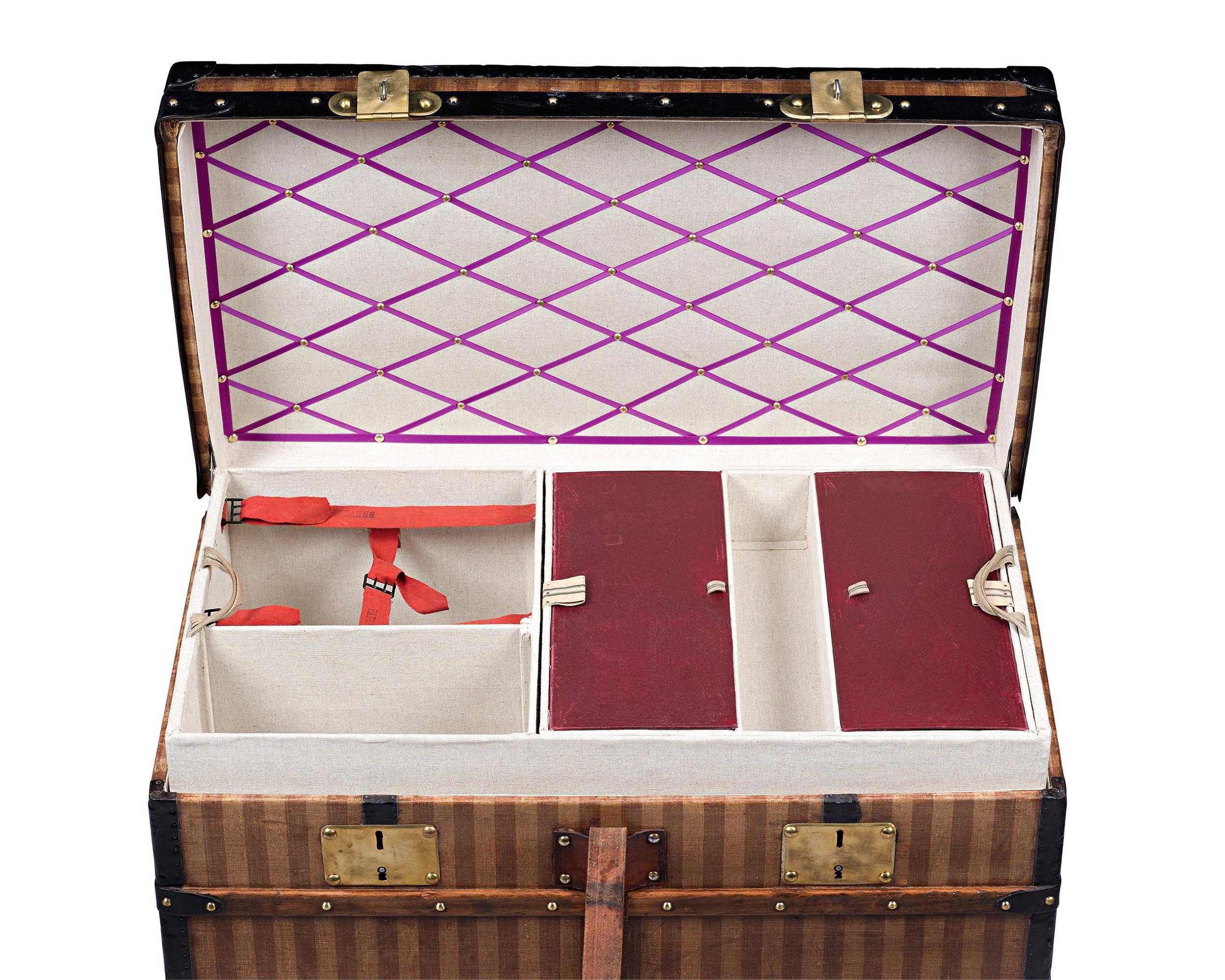 This outstanding and extremely rare Louis Vuitton steamer trunk is a treasure. Crafted in the firm's flat-top style, this trunk boasts the Rayée (