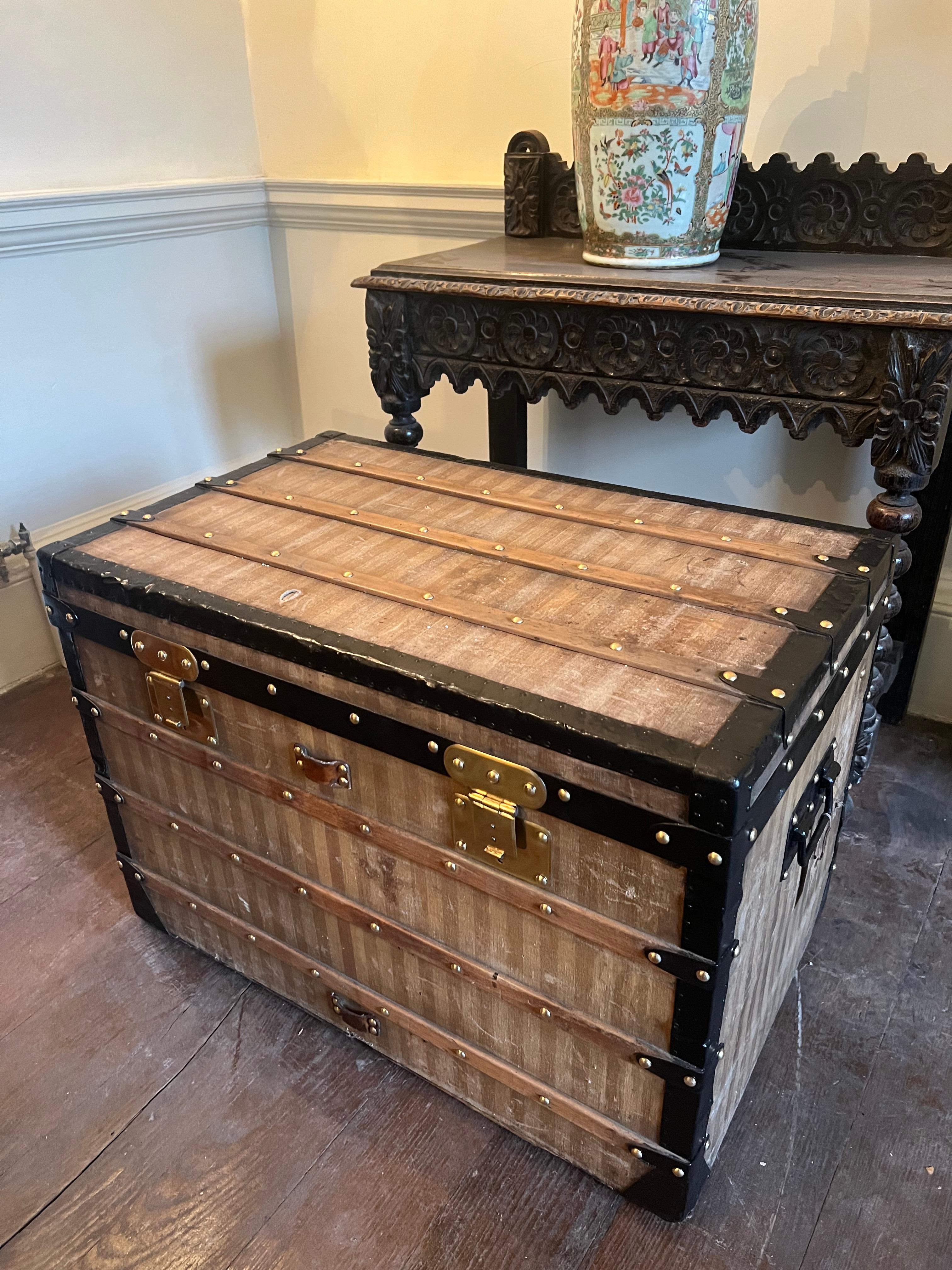 A Lovely and extremely Rare Louis Vuitton Striped Rayee trunk. 
Condition is great considering age, original key is present. Features all original Hardware, and LV stamps. This piece would look fantastic in any modern or traditional interior. 
Circa