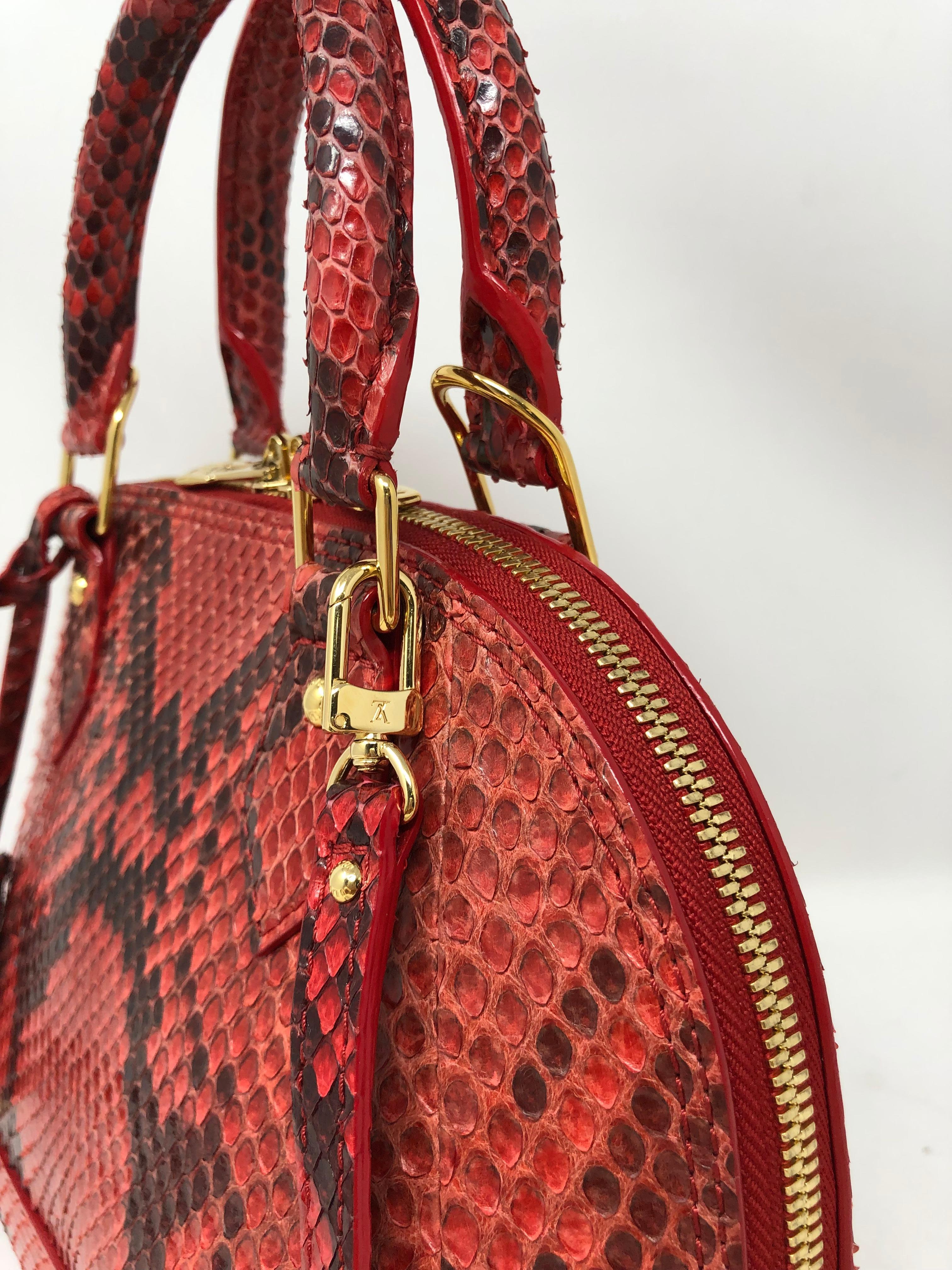 red and black louis vuitton bag