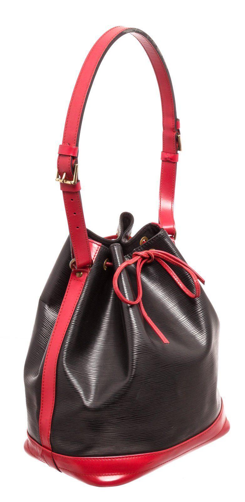 Louis Vuitton Red Black Epi Leather Handbags with silver-tone hardware, tan vachetta leather trim, leather shoulder strap, and drawstring closure.

26203MSC


Measurements:
	Length: 10 in / 25 cm
	Width: 7.5 in / 19 cm
	13 in / 33 cm
CONDITION: