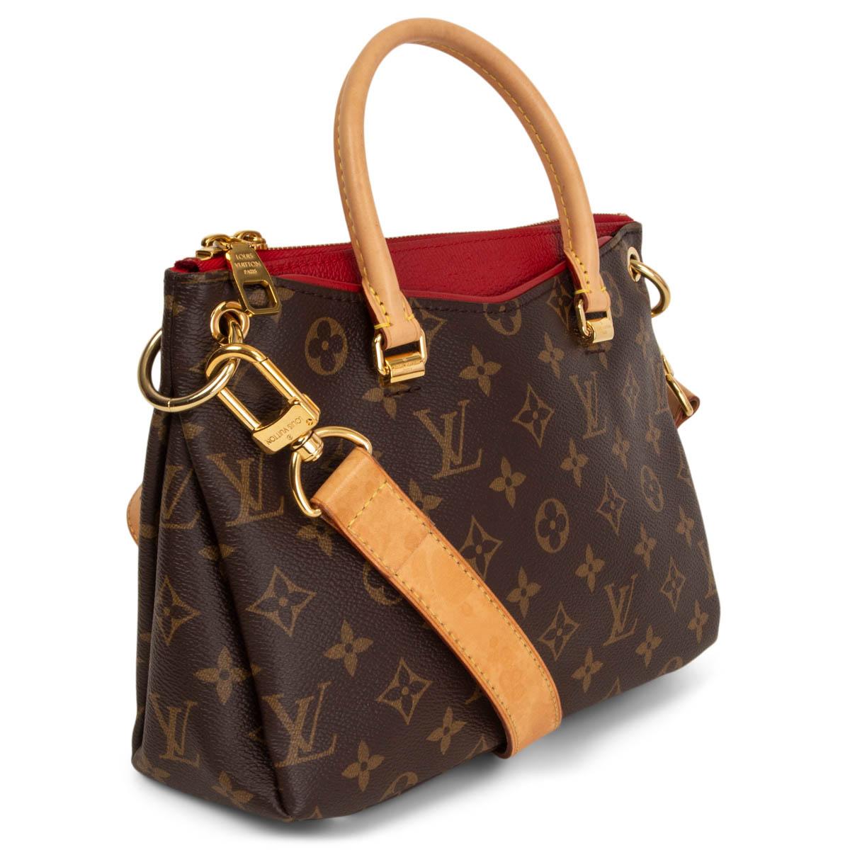 100% authentic Louis Vuitton Pallas BB Shoulder bag combines iconic Monogram canvas with supple red colored calfskin and natural cowhide-leather trim. The red leather forms a V shape at the front of the bag features two outside pockets. Opens with a