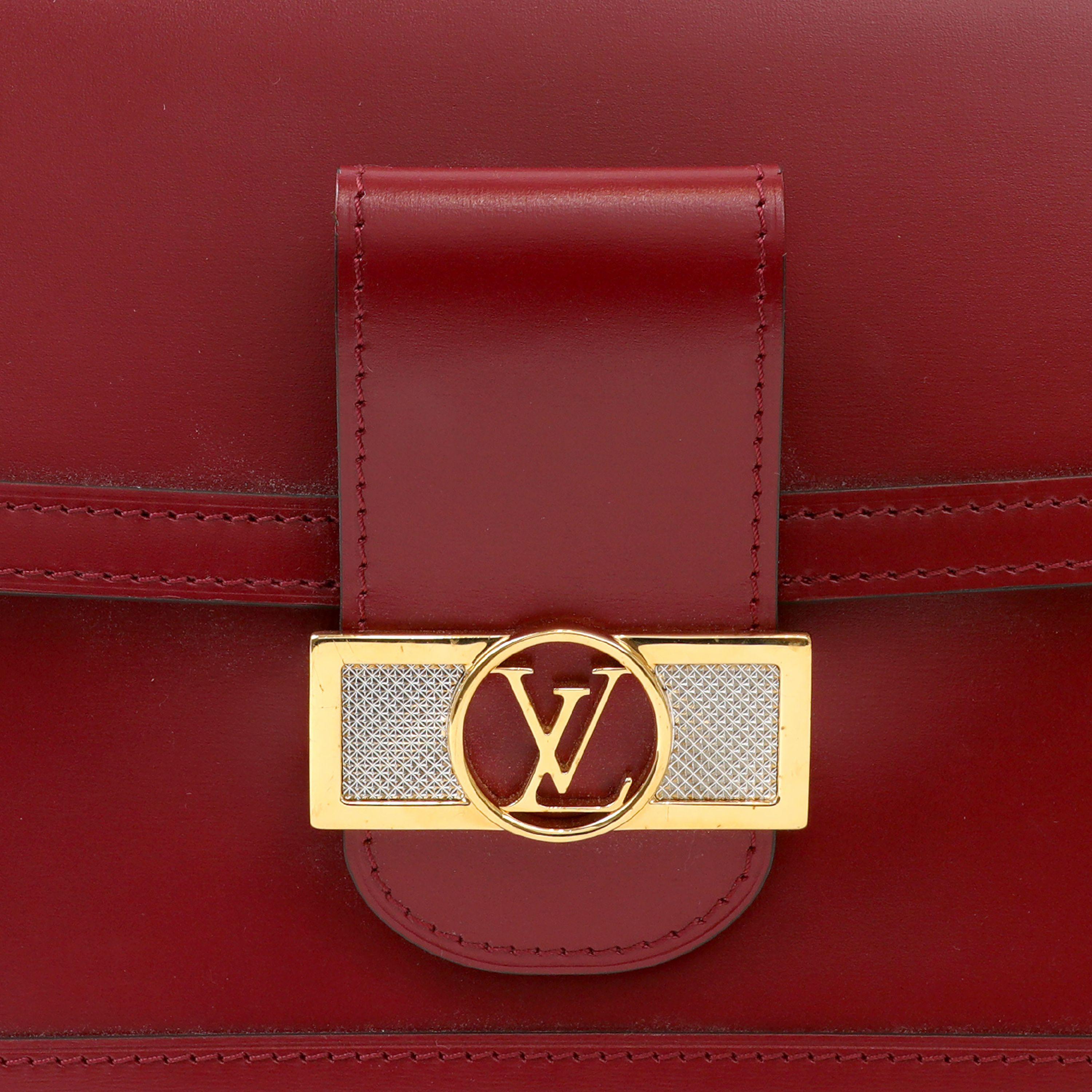 This authentic Louis Vuitton Cherry Berry Dauphine Shoulder bag in smooth calfskin is in excellent condition. Classic and striking in this fall’s most coveted color: red. Gold tone hardware, adjustable length shoulder strap with optional chain