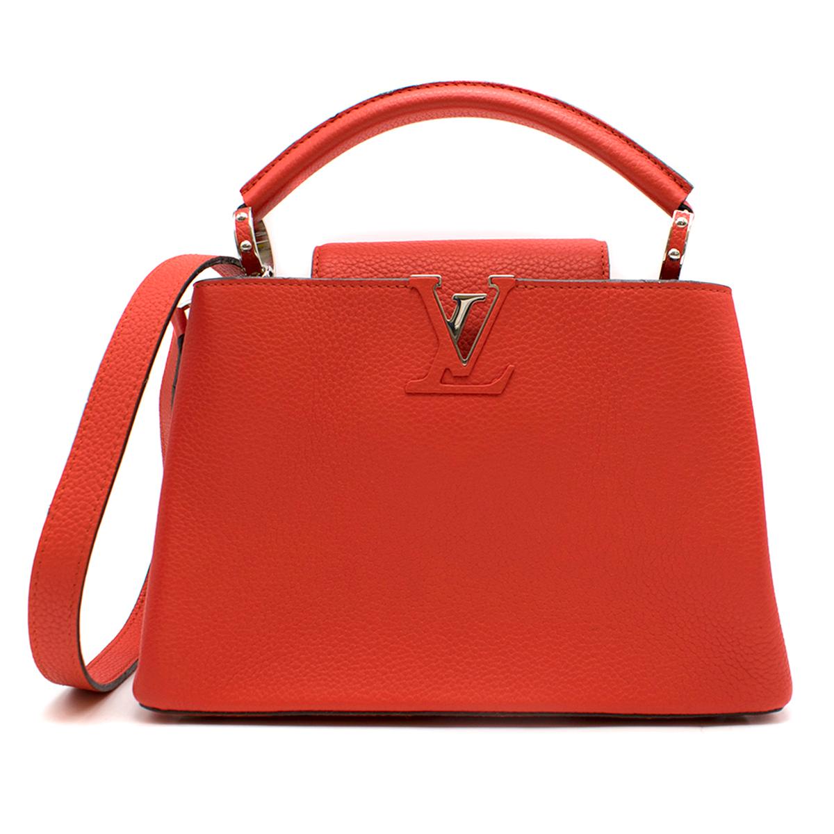 Louis Vuitton Red Capucines BB Shoulder Bag ( new with tag)

- Red Shoulder/ Top handle Bag 
- Grained calfskin leather 
- LV logo detail at front top with silver toned leather 
- Top handle, rolled leather and studded ringlet 
- Flap front,