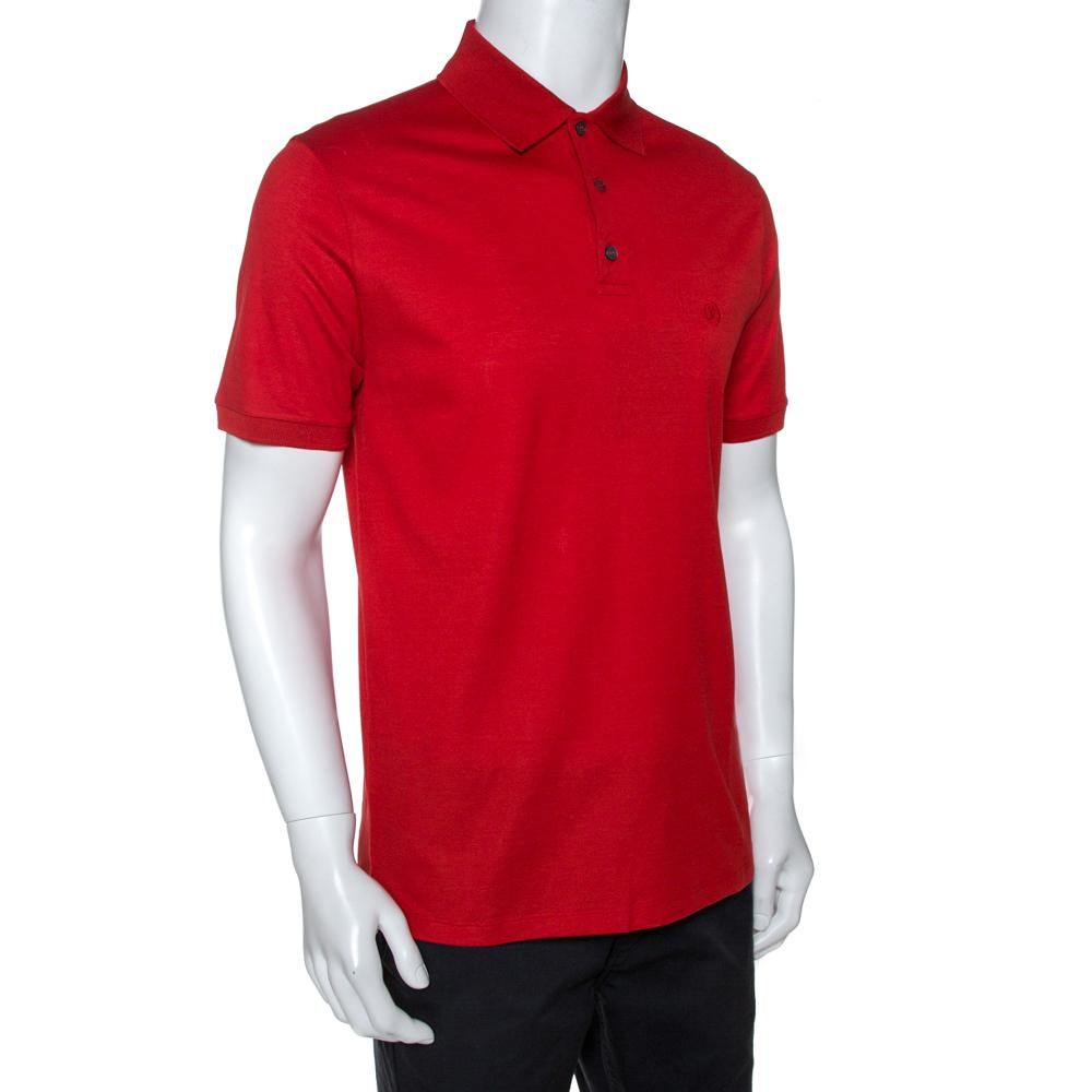Made by Louis Vuitton, a stylish creation like this one is a fashion basic. This red t-shirt paired with stylish bottoms will exude a contemporary appeal. Made from 100% quality cotton, this shirt feature short sleeves and front buttons.

