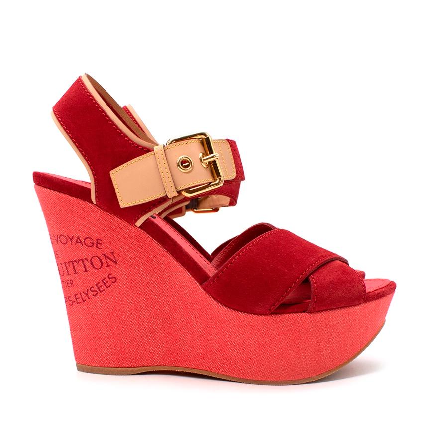 Louis Vuitton Red Denim & Suede Crossover Wedge Sandals
 

 - Bold, red hued suede foot straps, and bleached out orangey-red toned denim wrapped wedge heel
 - Adjustable ankle strap with gold-tone metal buckle
 - 