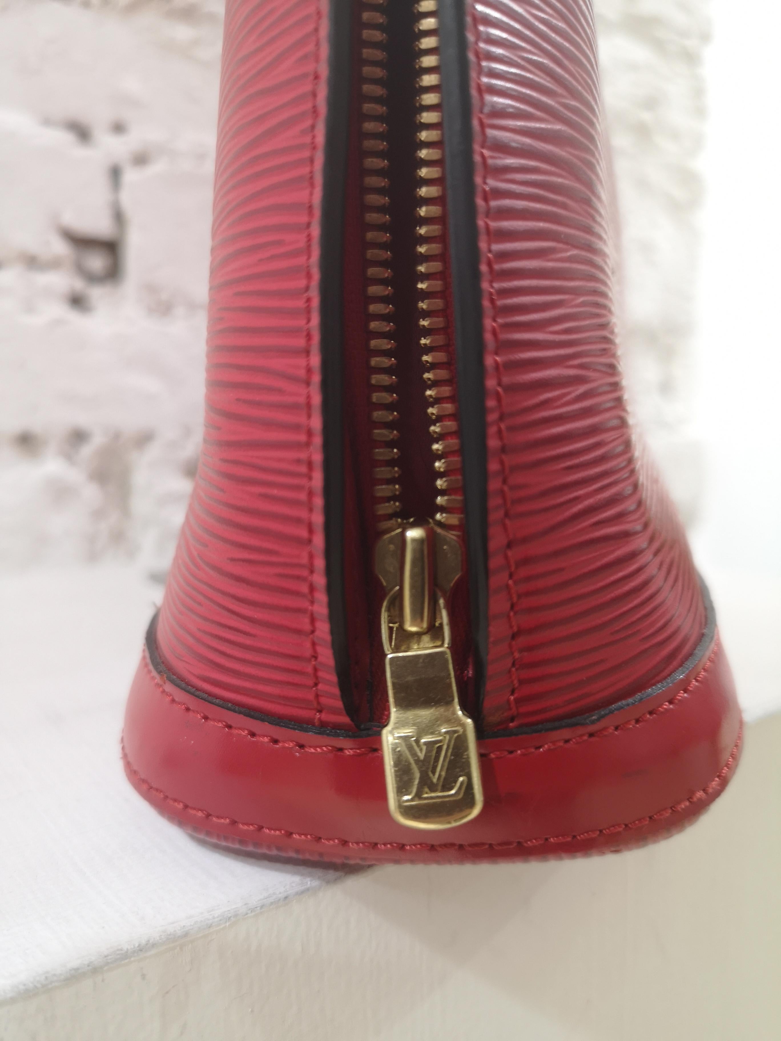 Brown Louis Vuitton red epi alma shoulder shopper bag